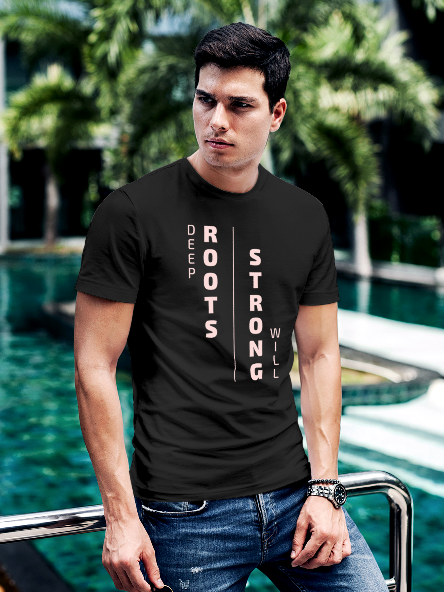 Model wearing Men's Dark Grey Round Neck T-shirt with 'Deep Roots Strong Will' design, offering effortless style and premium comfort