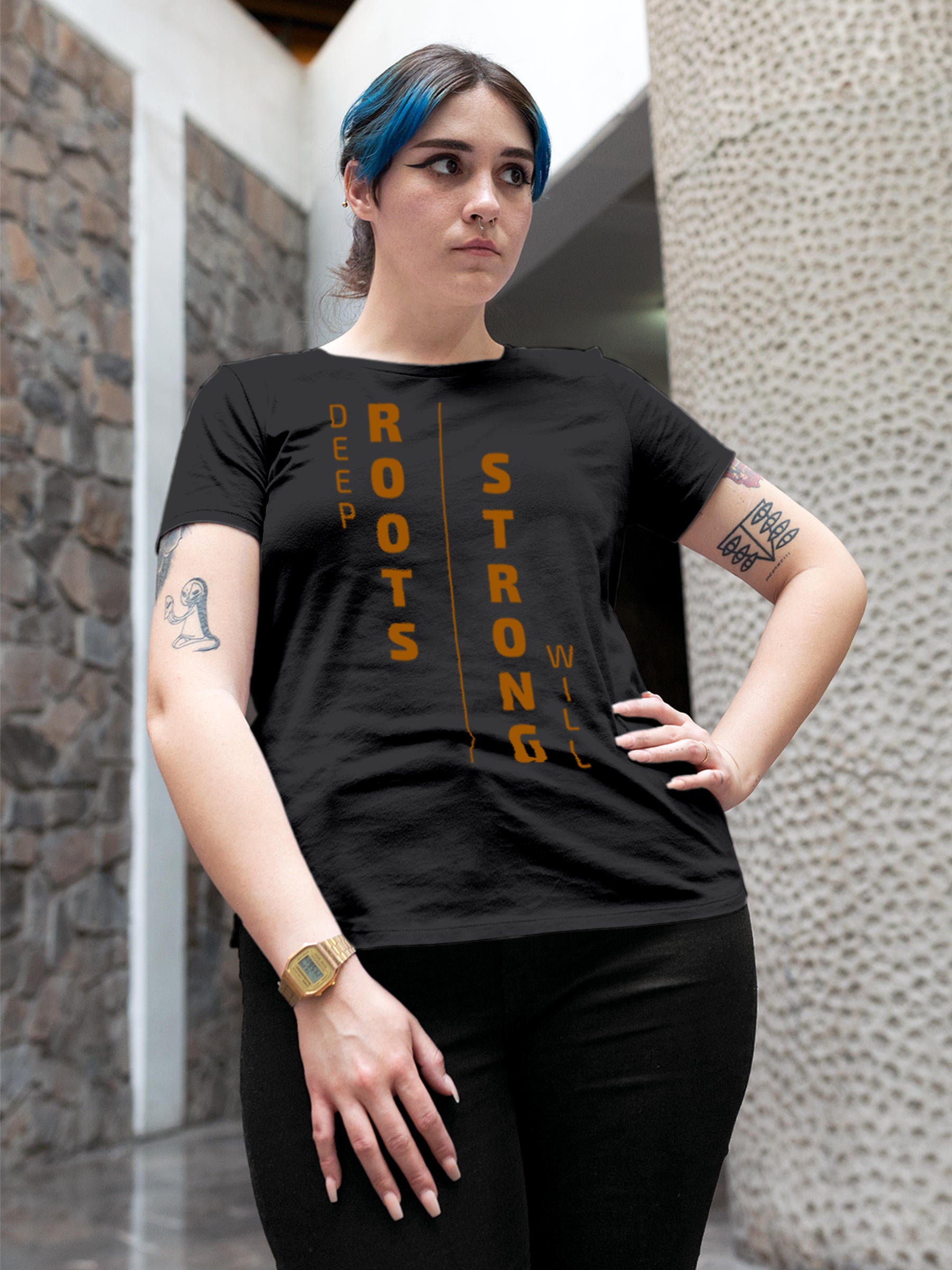 Model wearing Women's Dark Grey Round Neck T-shirt with 'Deep Roots Strong Will' design, offering effortless style and premium comfort