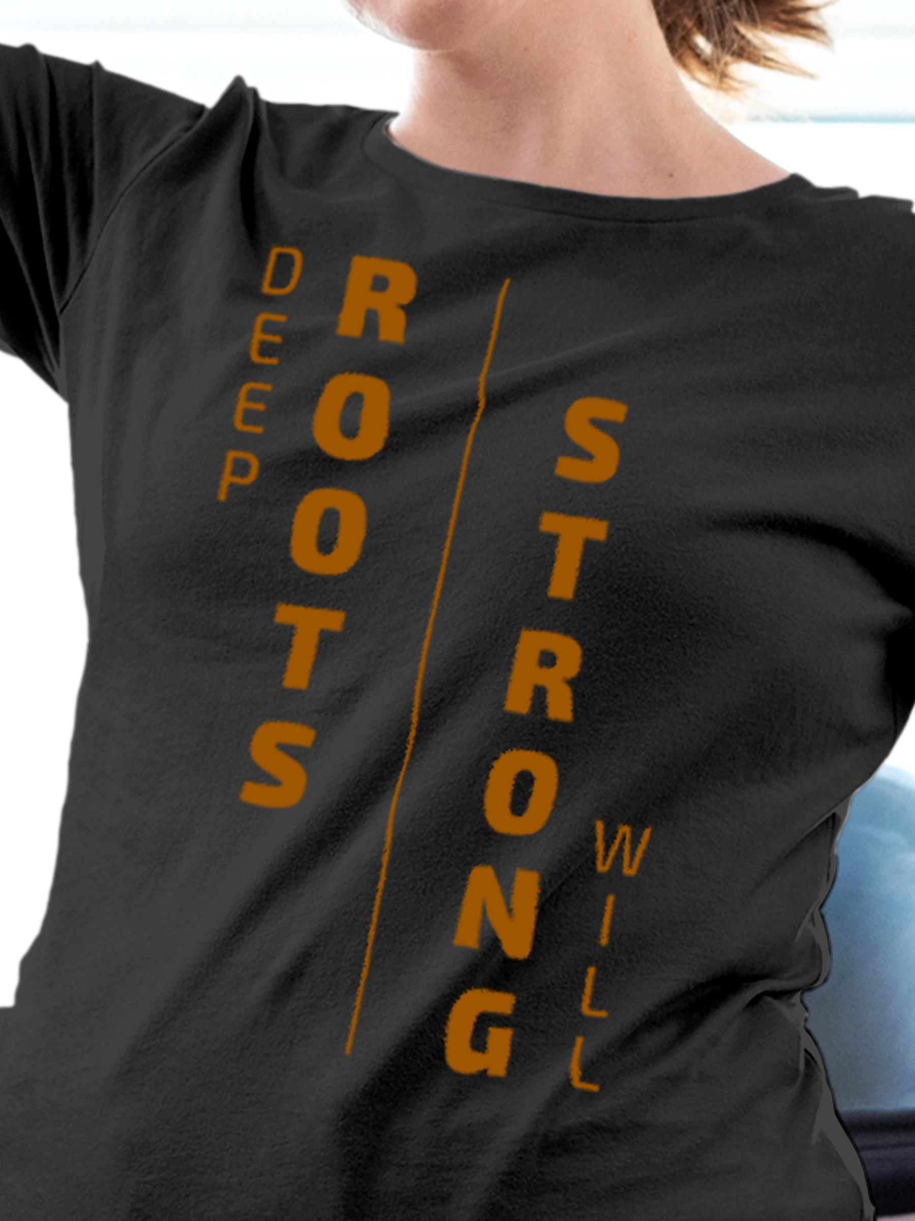 Close up of 'Deep Roots Strong Will' design on Women's Dark Grey Round Neck T-shirt, highlighting intricate details and vibrant print.