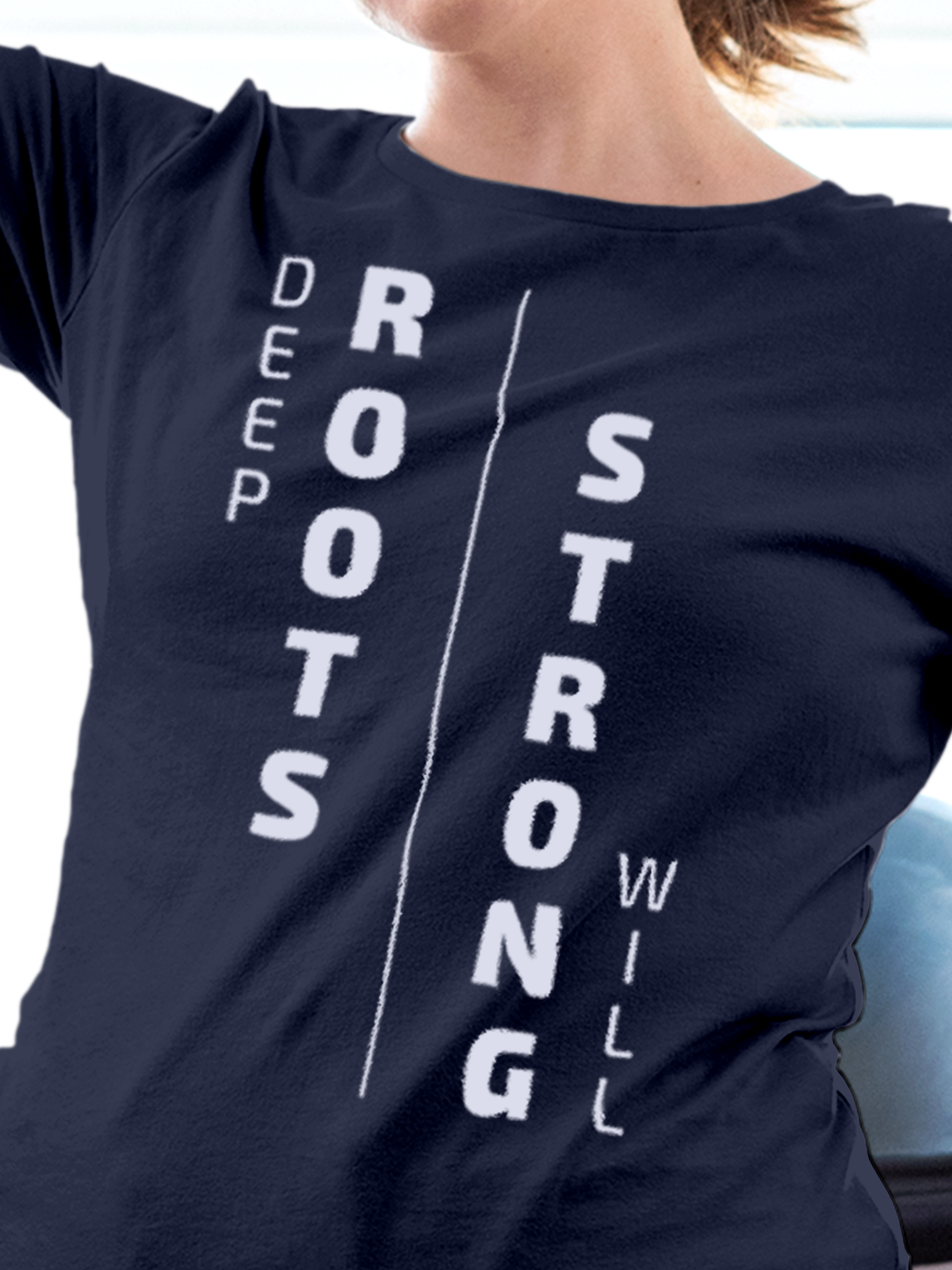 Close up of 'Deep Roots Strong Will' design on Women's Navy Blue Round Neck T-shirt, highlighting intricate details and vibrant print.