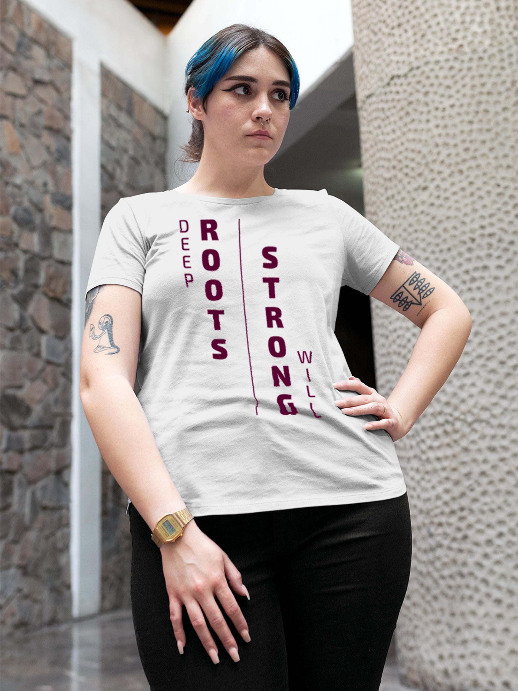 Model wearing Women's White Round Neck T-shirt with 'Deep Roots Strong Will' design, offering effortless style and premium comfort