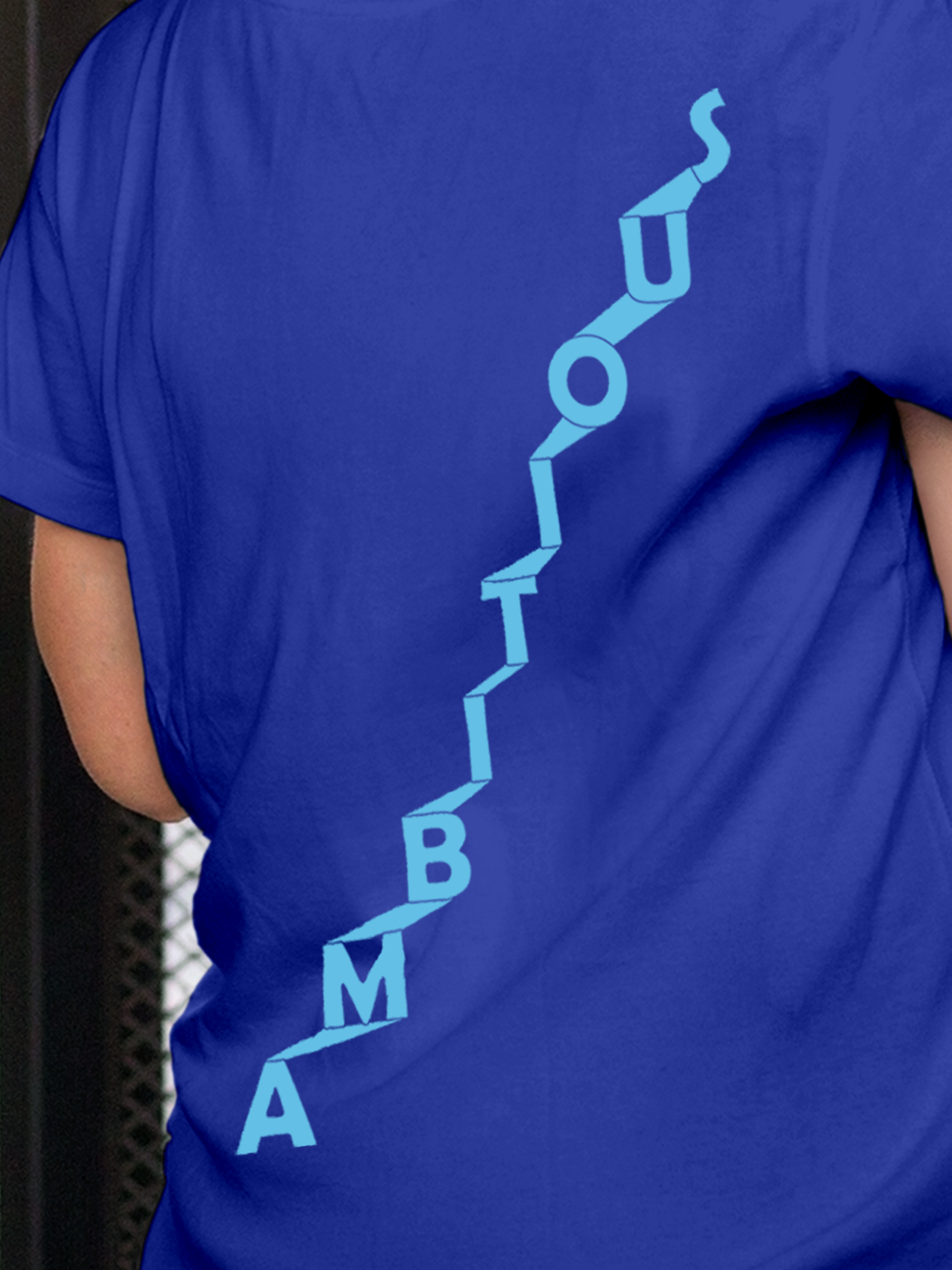 Close up of 'Ambitious' design on Women's Blue Round Neck T-shirt, highlighting intricate details and vibrant print.