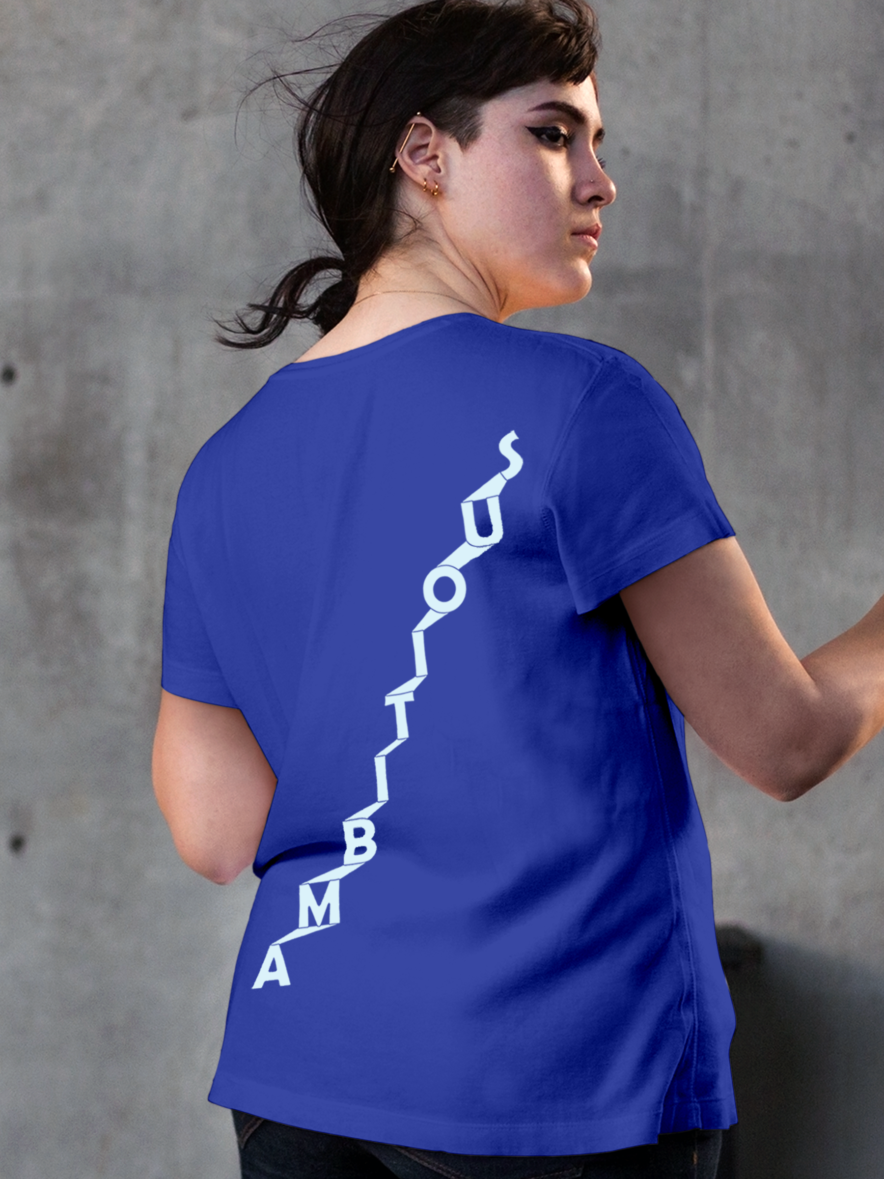 Model wearing Women's Blue Round Neck T-shirt with 'Ambitious' design, offering effortless style and premium comfort