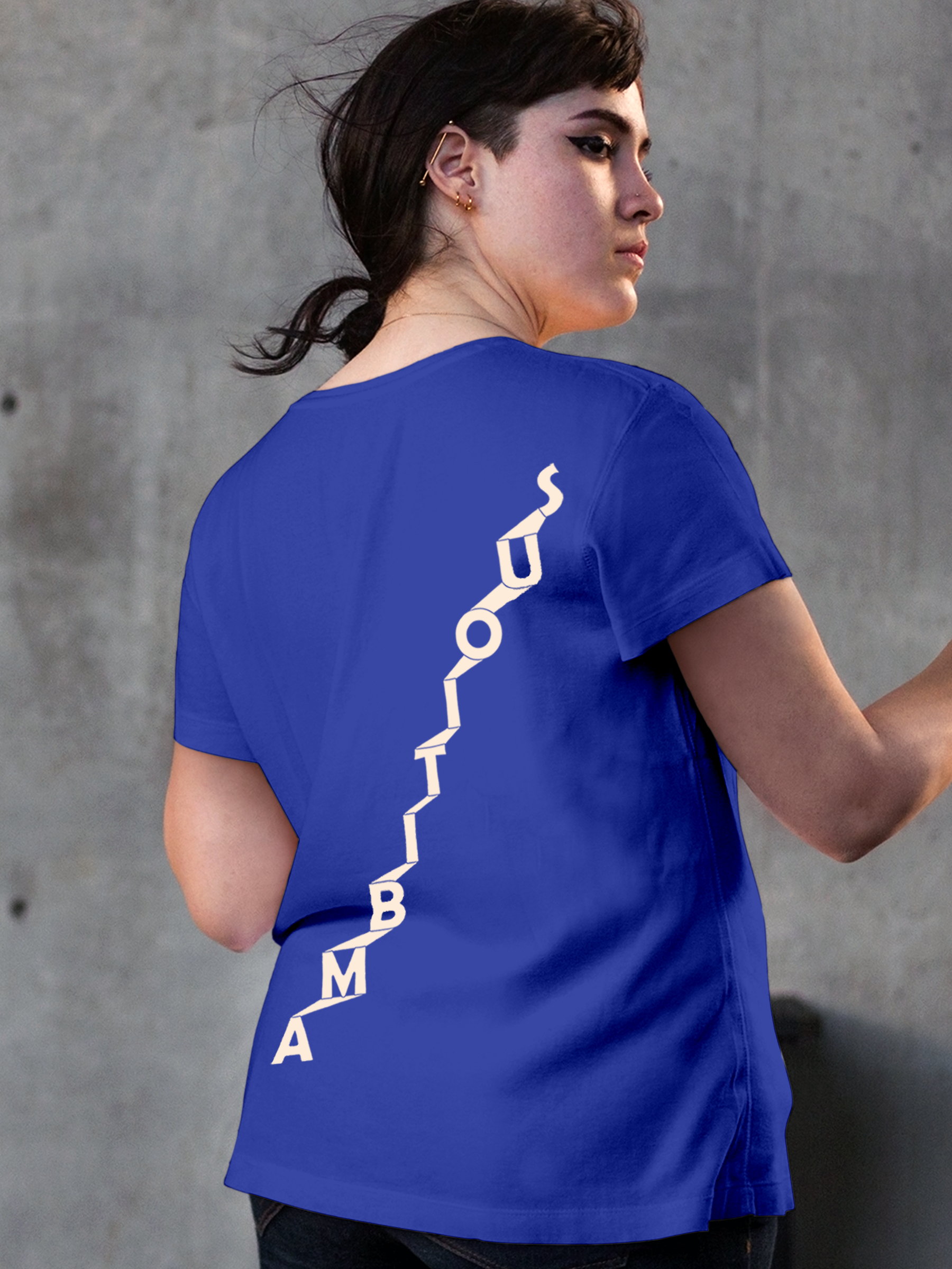 Model wearing Women's Blue Round Neck T-shirt with 'Ambitious' design, offering effortless style and premium comfort