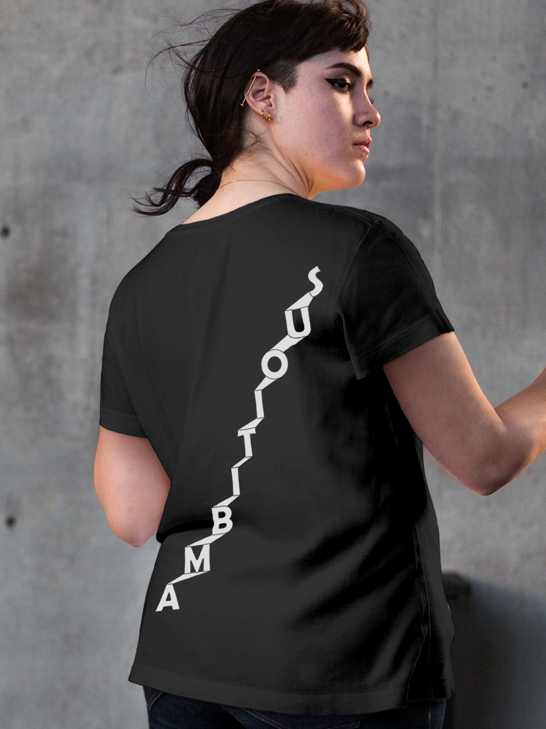Model wearing Women's Dark Grey Round Neck T-shirt with 'Ambitious' design, offering effortless style and premium comfort