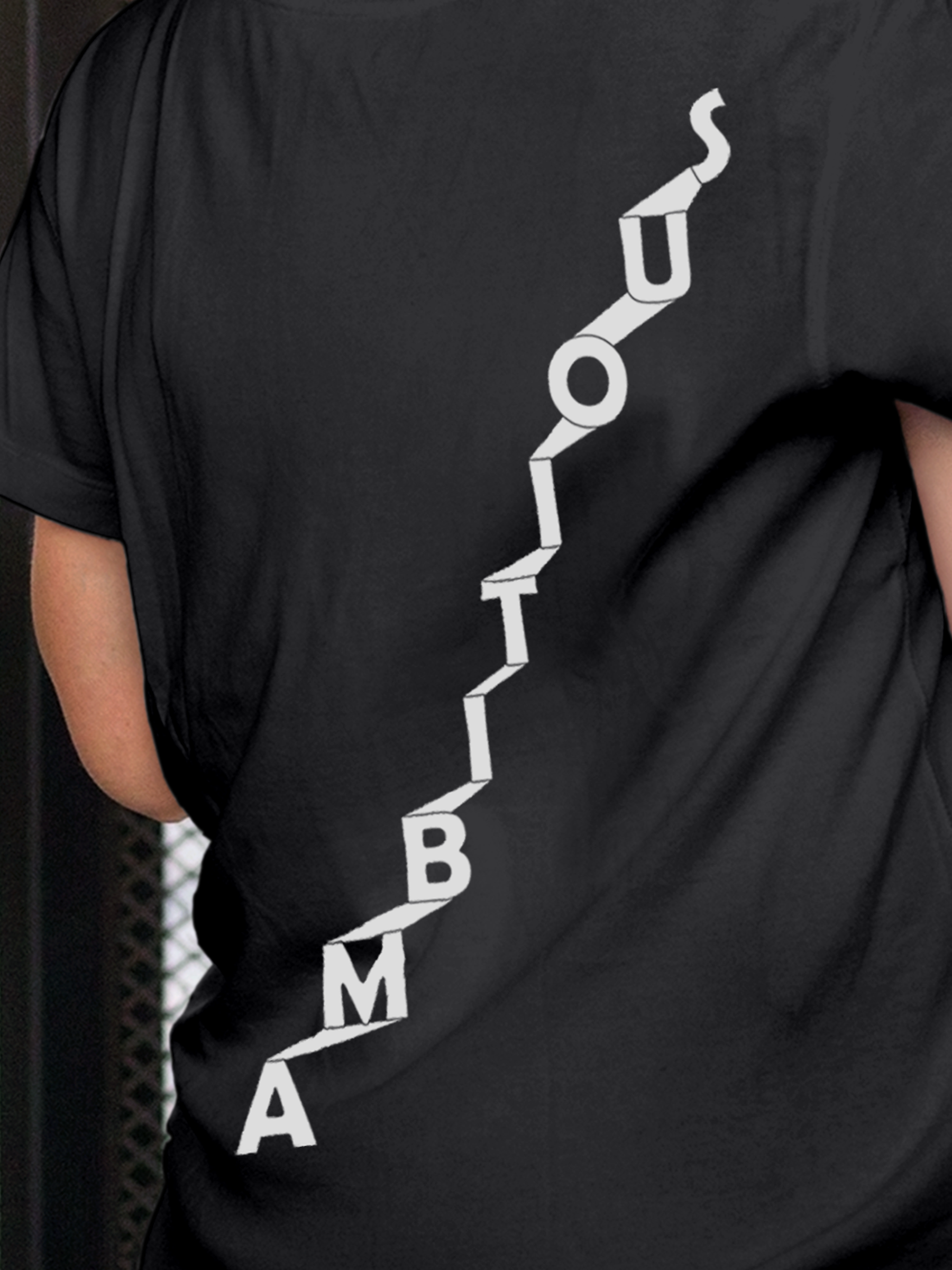 Close up of 'Ambitious' design on Women's Dark Grey Round Neck T-shirt, highlighting intricate details and vibrant print.