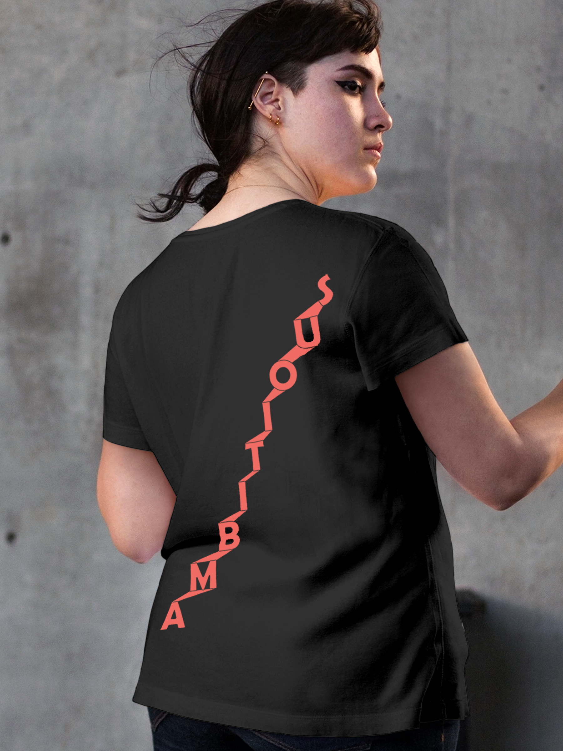 Model wearing Women's Dark Grey Round Neck T-shirt with 'Ambitious' design, offering effortless style and premium comfort