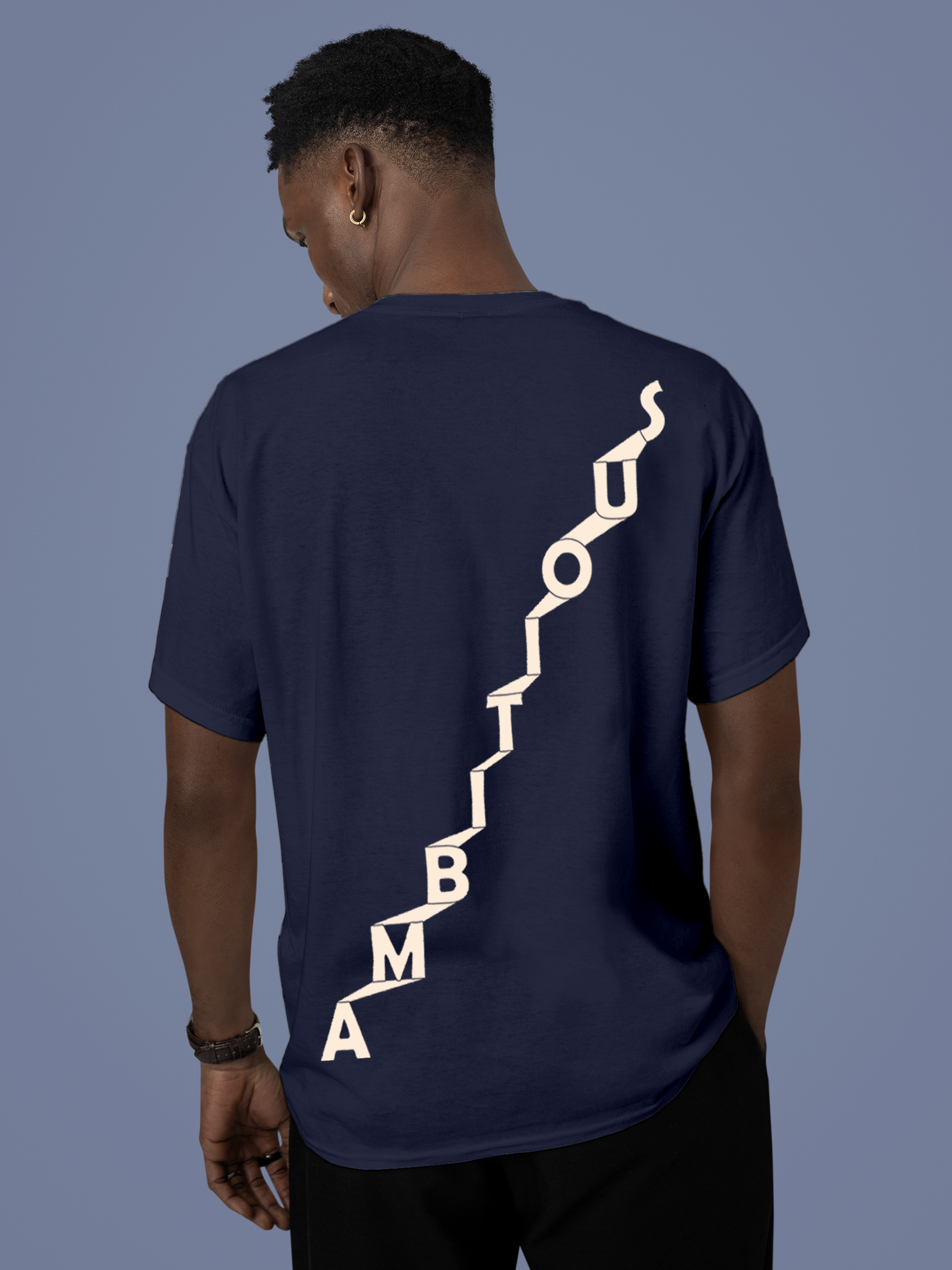 Model wearing Men's Navy Blue Round Neck T-shirt with 'Ambitious' design, offering effortless style and premium comfort