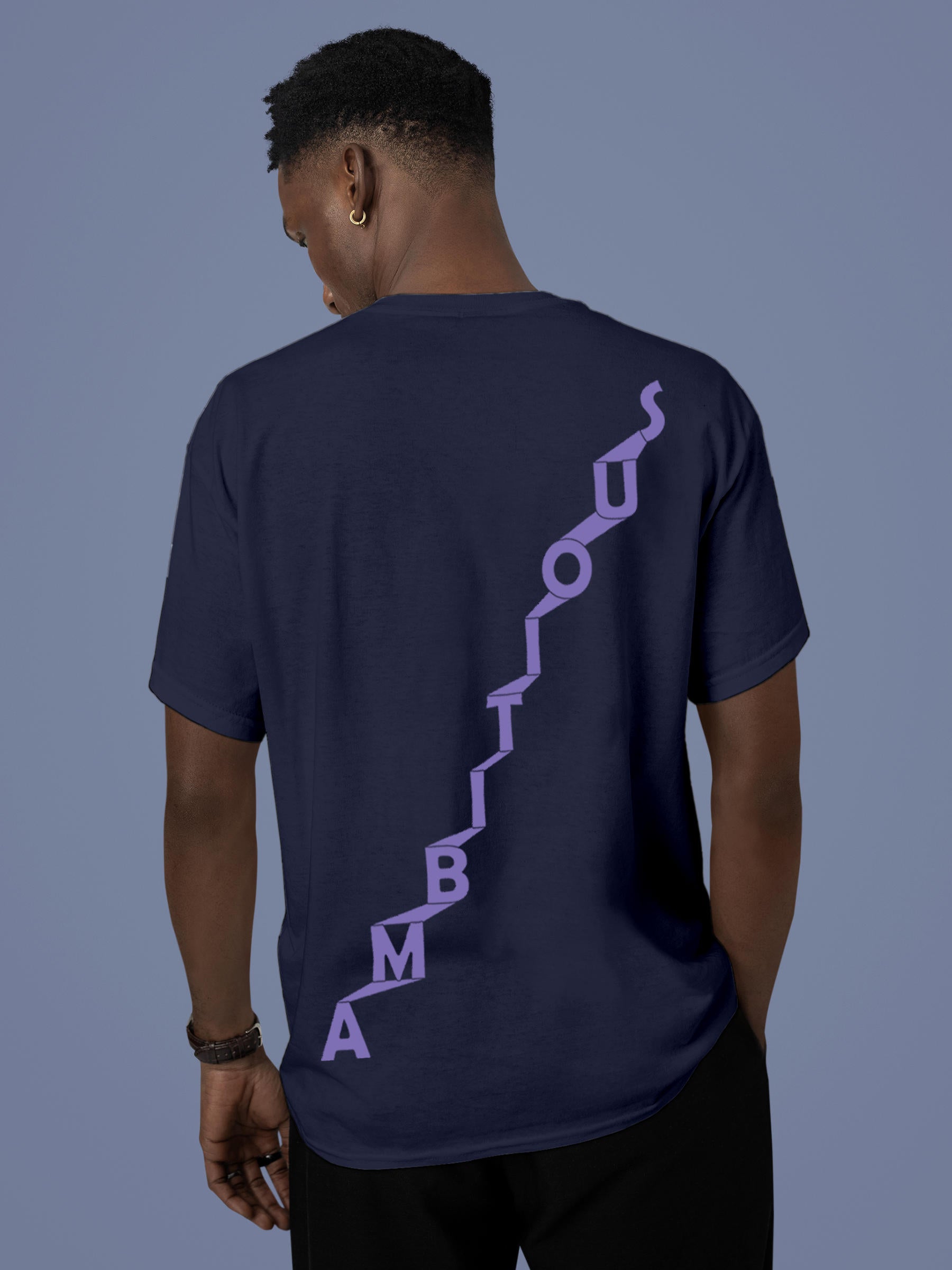 Model wearing Men's Navy Blue Round Neck T-shirt with 'Ambitious' design, offering effortless style and premium comfort