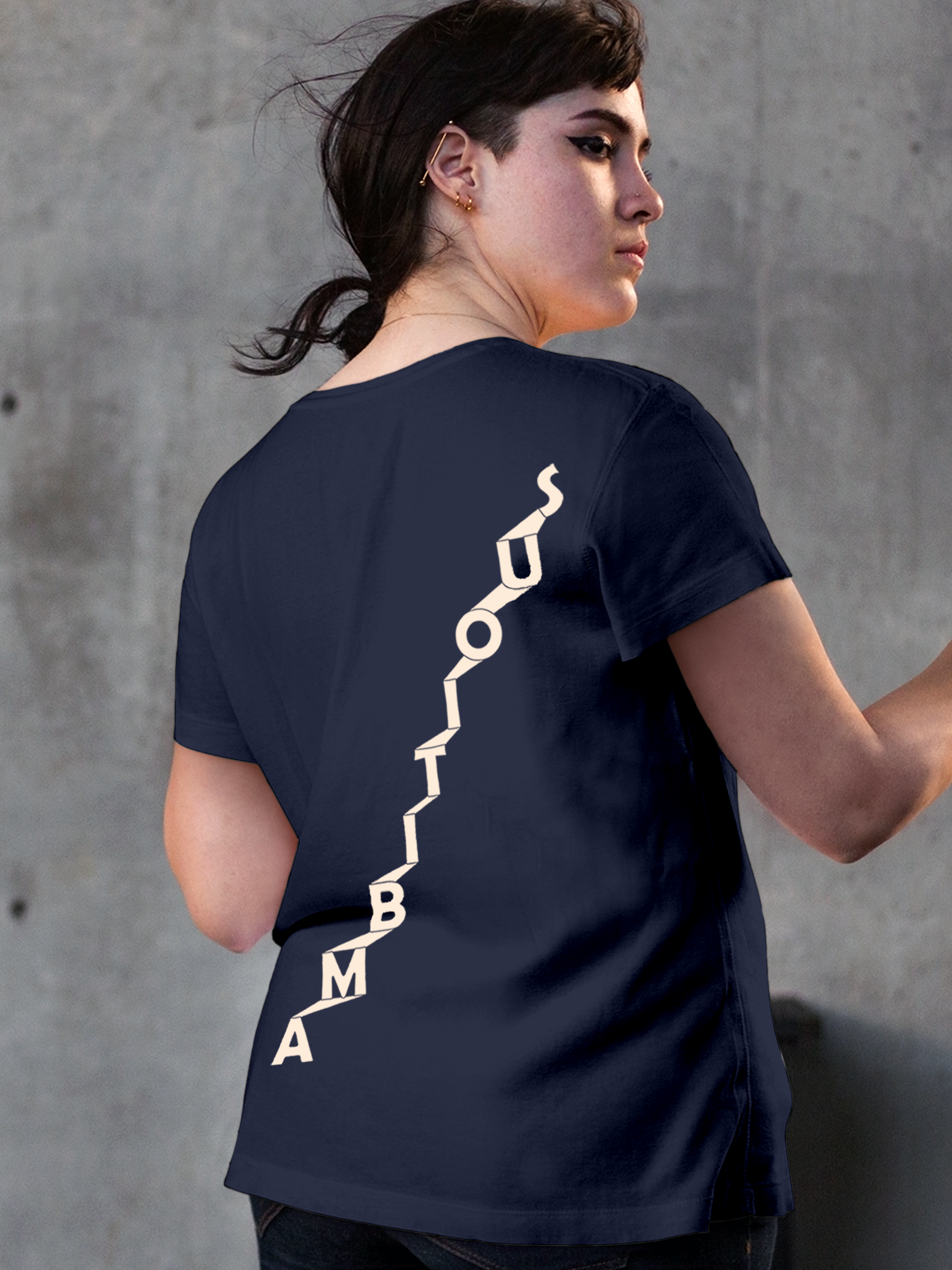 Model wearing Women's Navy Blue Round Neck T-shirt with 'Ambitious' design, offering effortless style and premium comfort