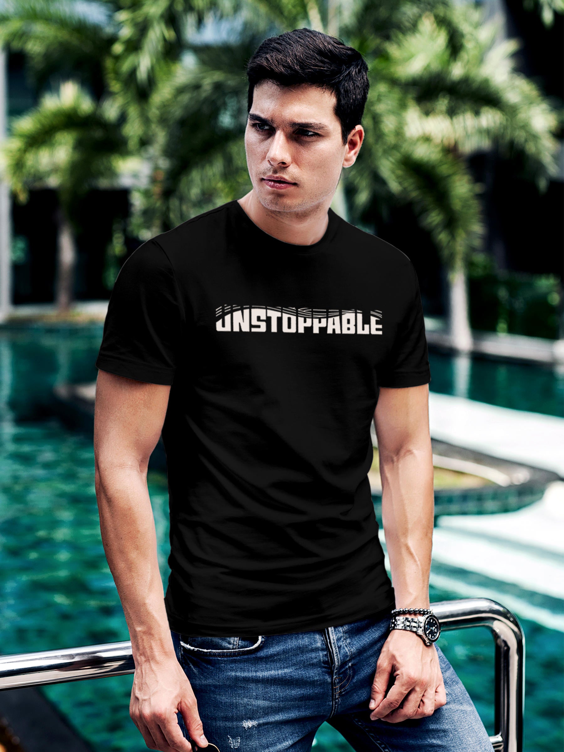 Model wearing Men's Black Round Neck T-shirt with 'Unstoppable' design, offering effortless style and premium comfort