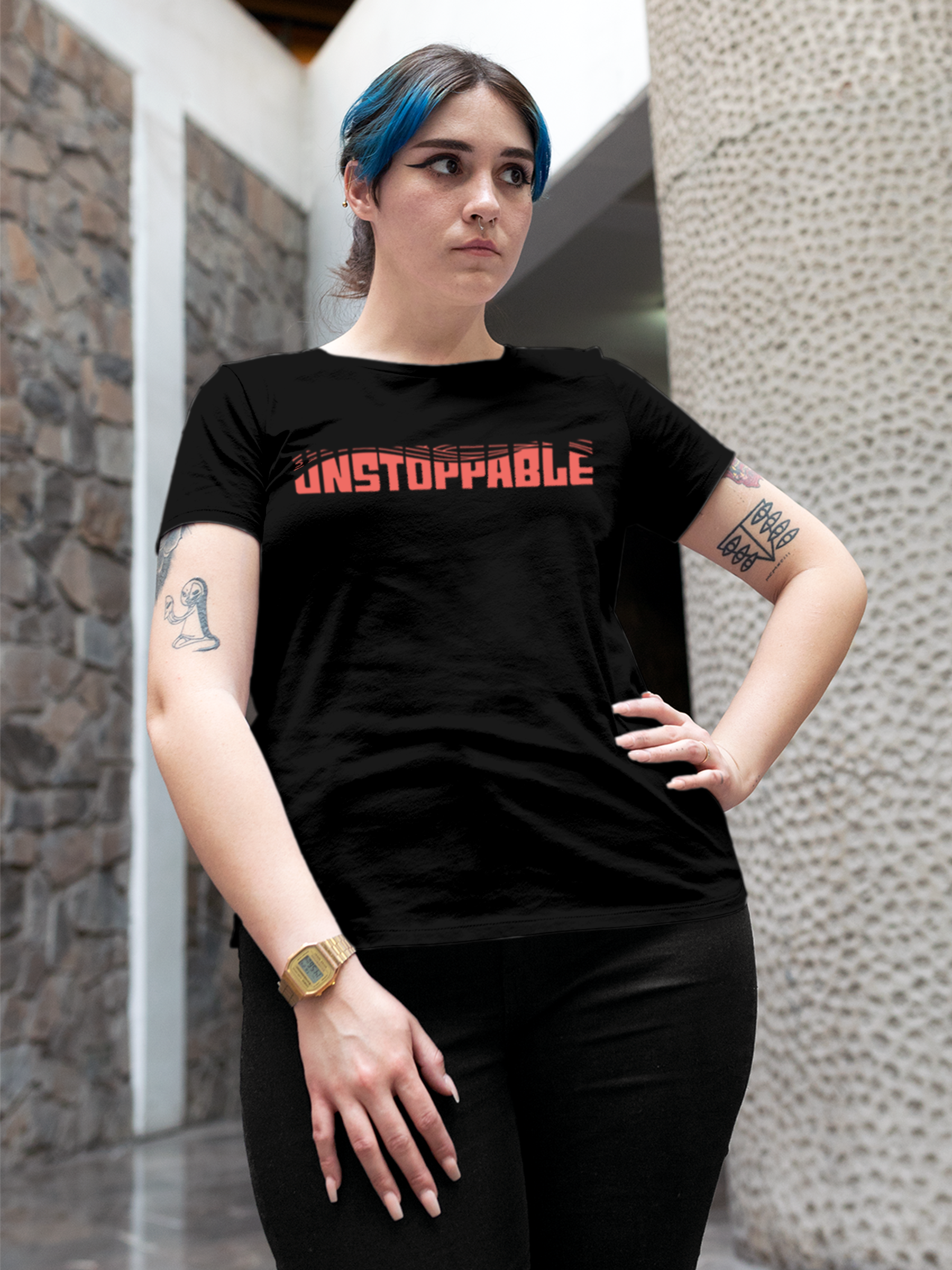 Model wearing Women's Black Round Neck T-shirt with 'Unstoppable' design, offering effortless style and premium comfort