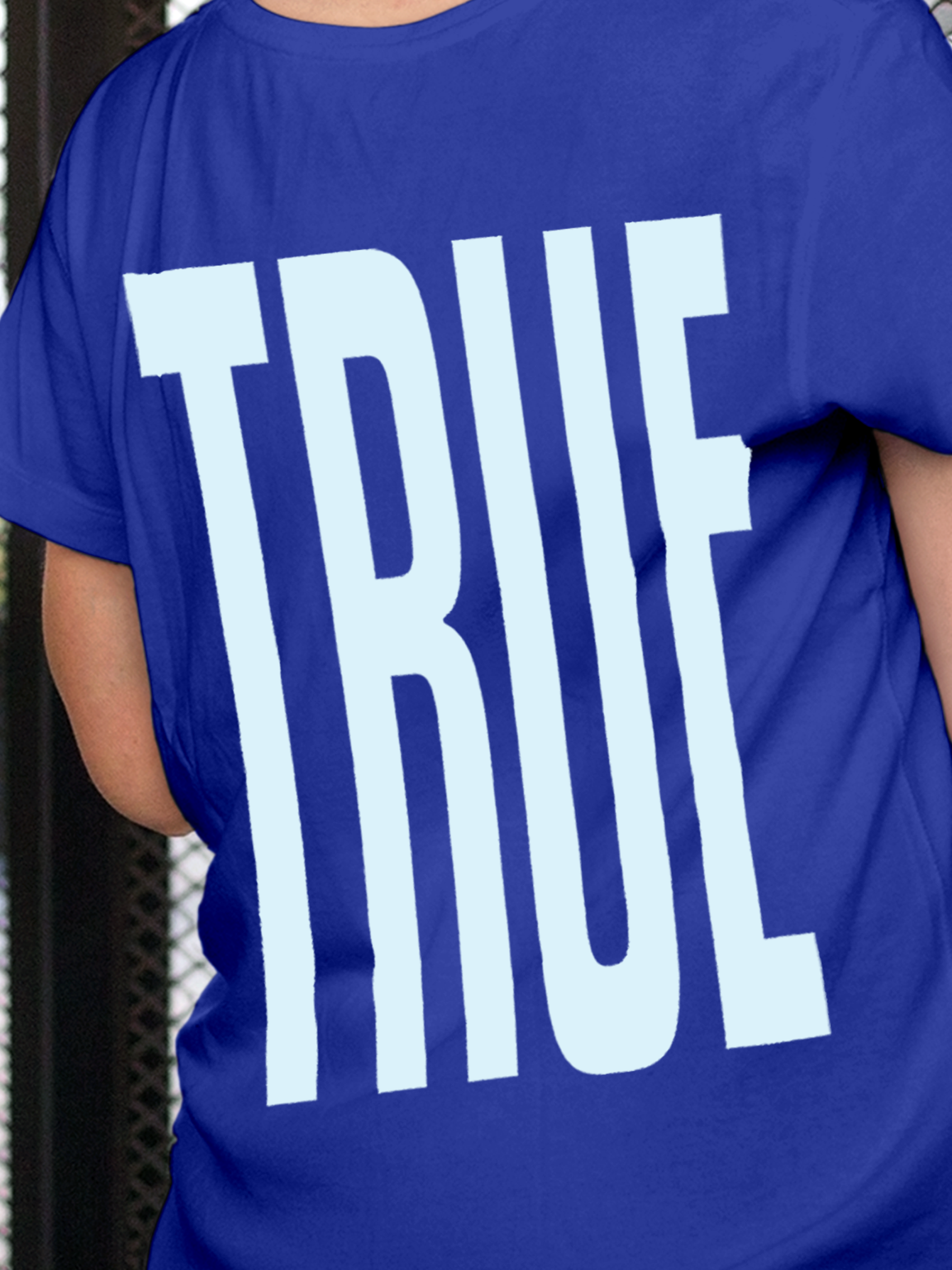 Close up of 'Truth' design on Women's Blue Round Neck T-shirt, highlighting intricate details and vibrant print.
