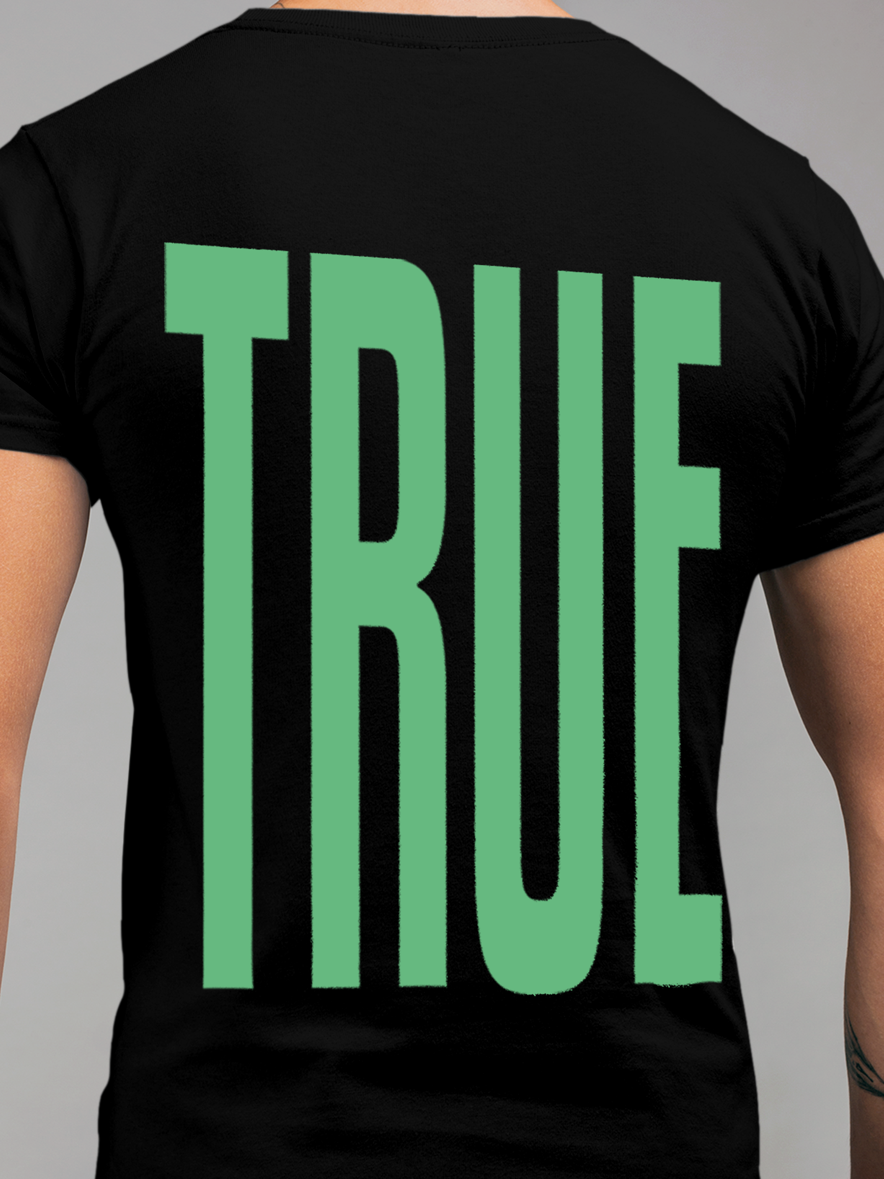 Close up of 'Truth' design on Men's Black Round Neck T-shirt, highlighting intricate details and vibrant print.