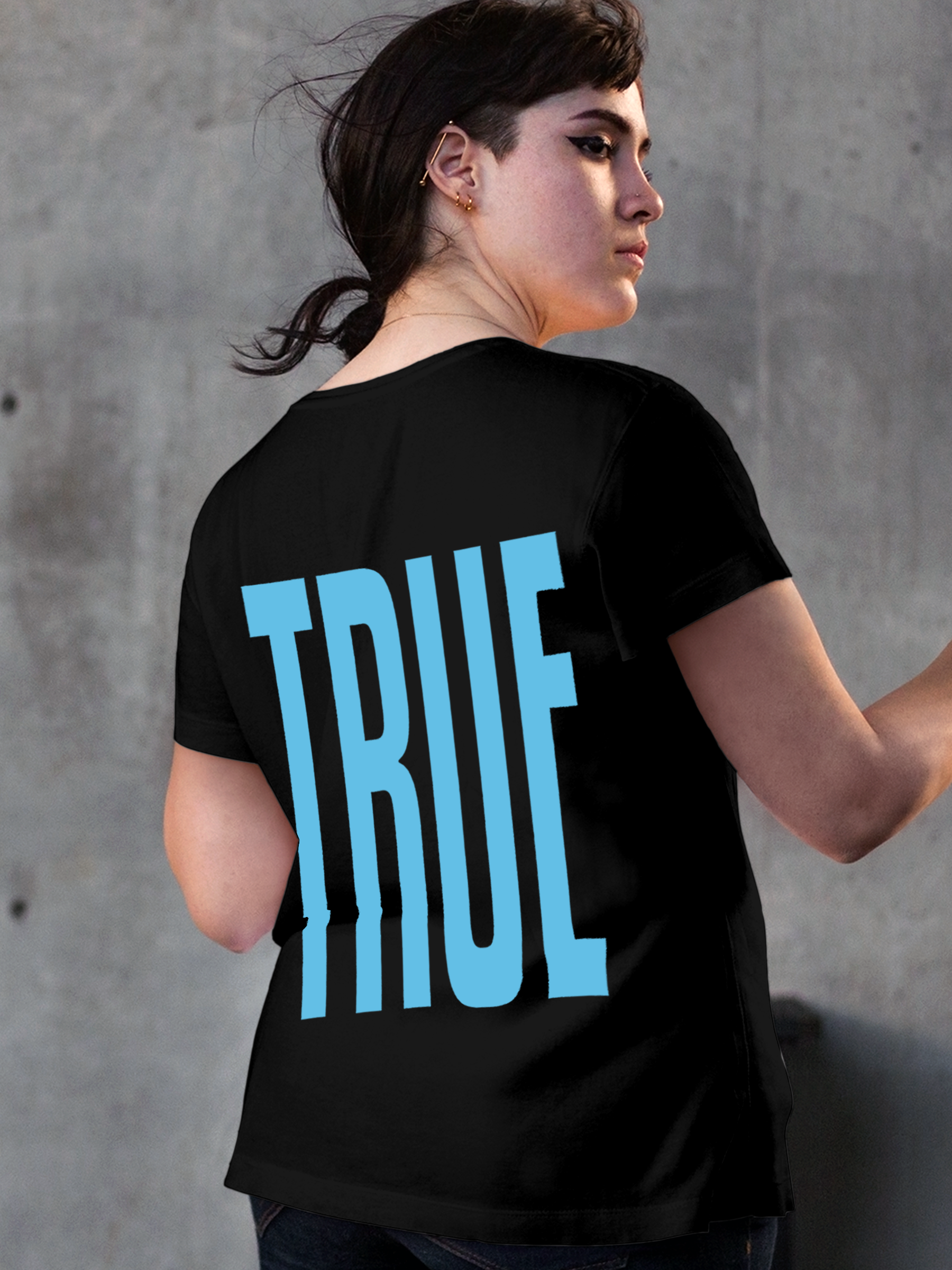 Model wearing Women's Black Round Neck T-shirt with 'Truth' design, offering effortless style and premium comfort