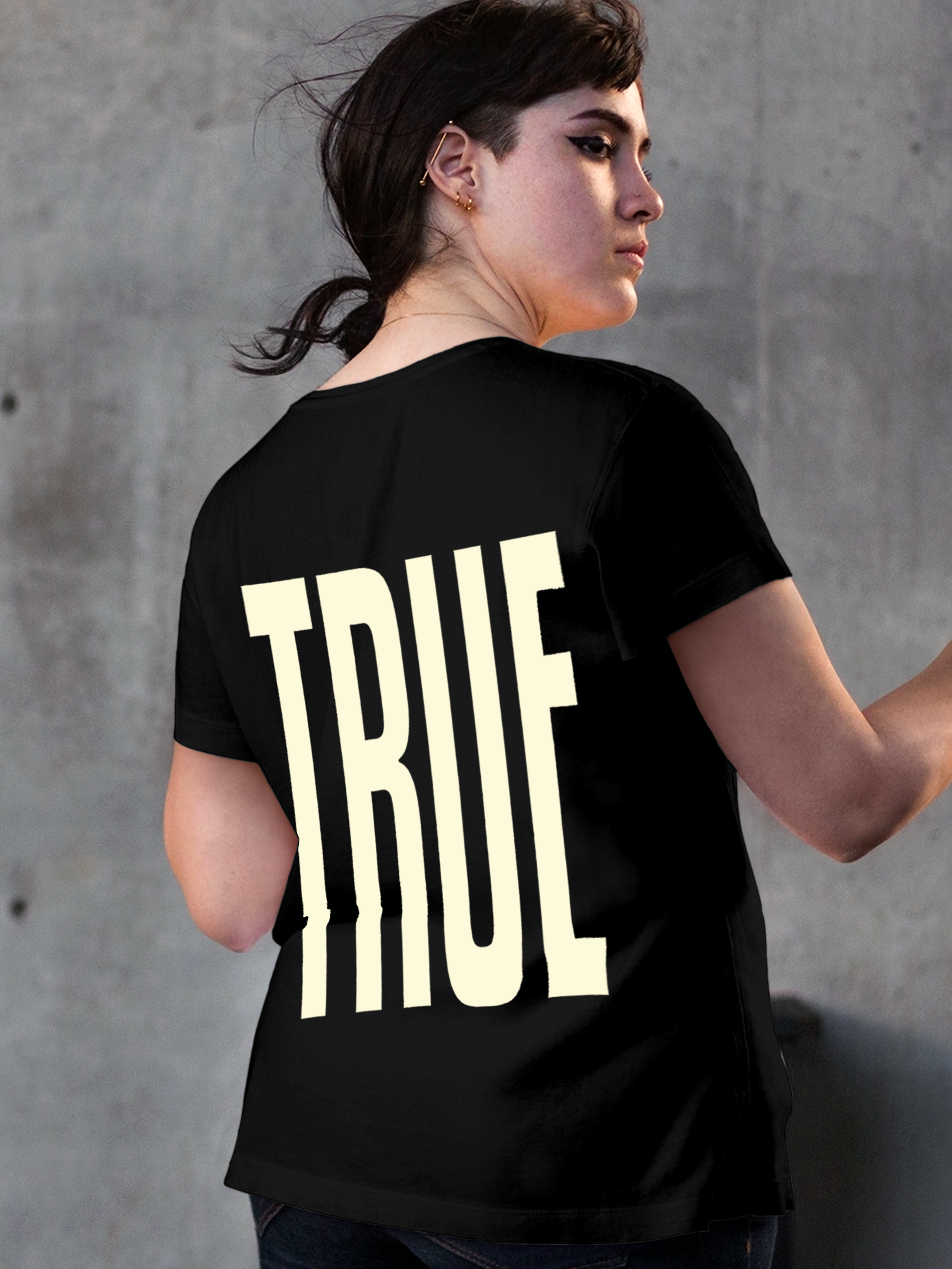 Model wearing Women's Black Round Neck T-shirt with 'Truth' design, offering effortless style and premium comfort