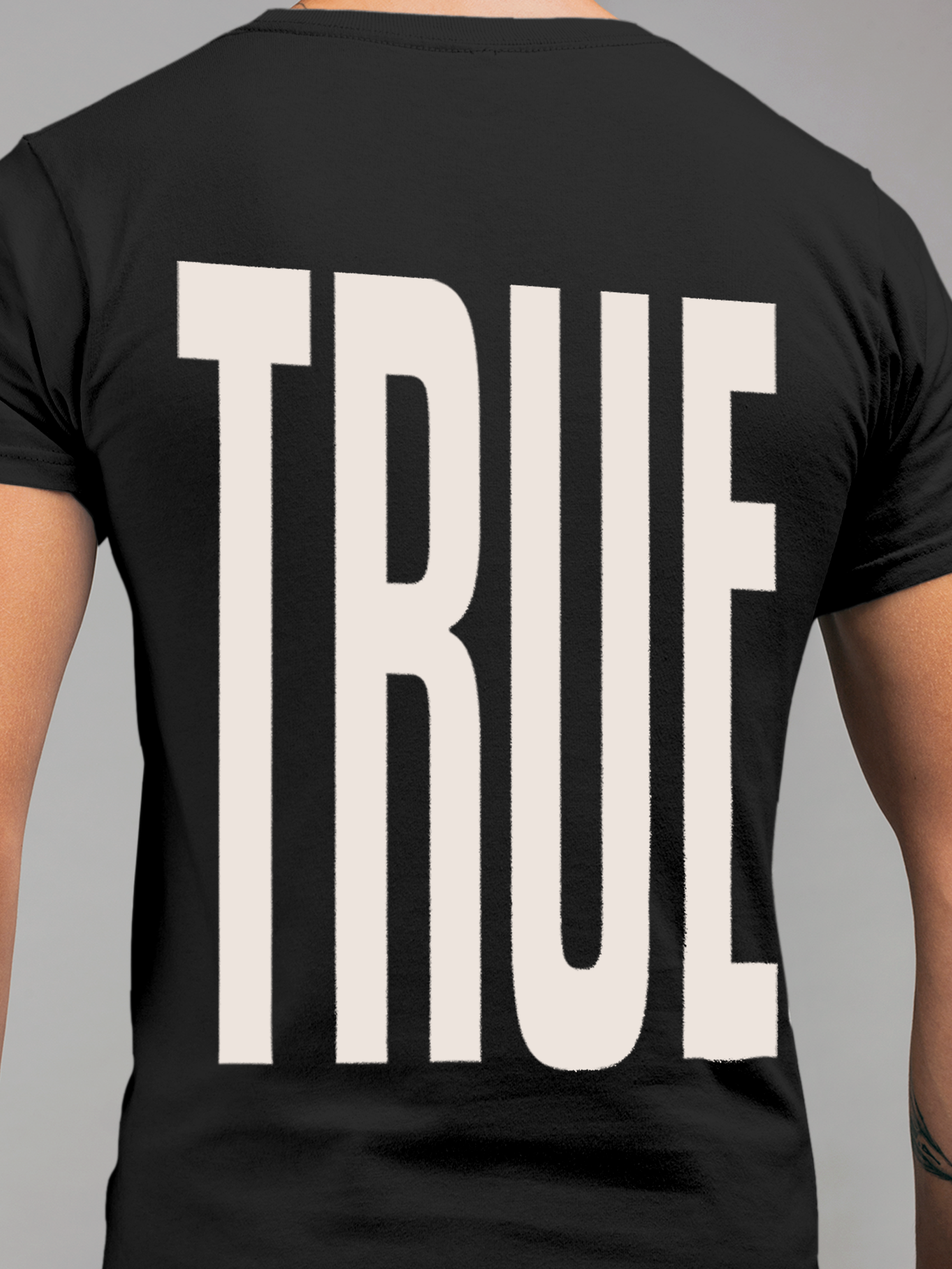 Close up of 'Truth' design on Men's Dark Grey Round Neck T-shirt, highlighting intricate details and vibrant print.