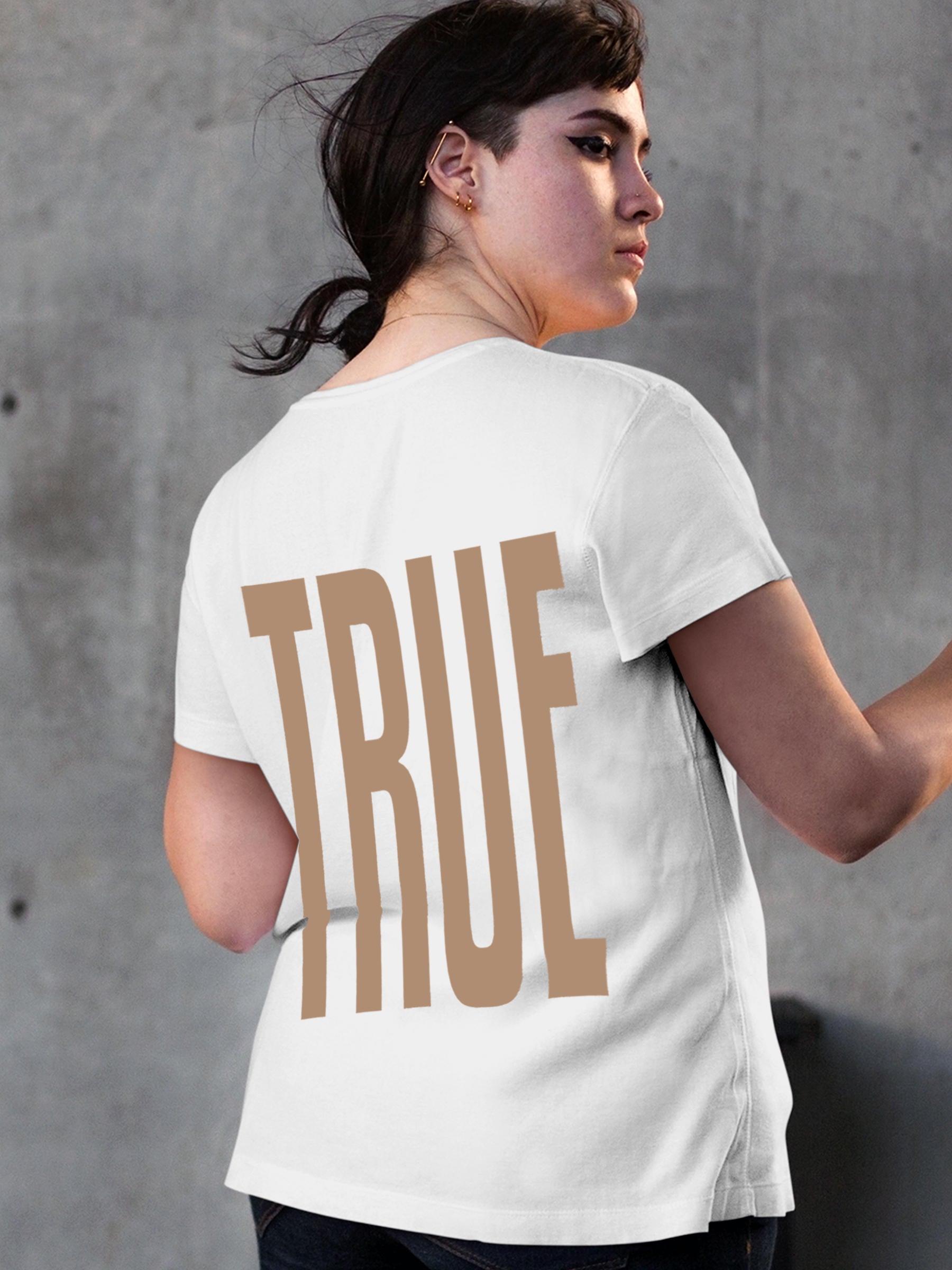 Model wearing Women's White Round Neck T-shirt with 'Truth' design, offering effortless style and premium comfort