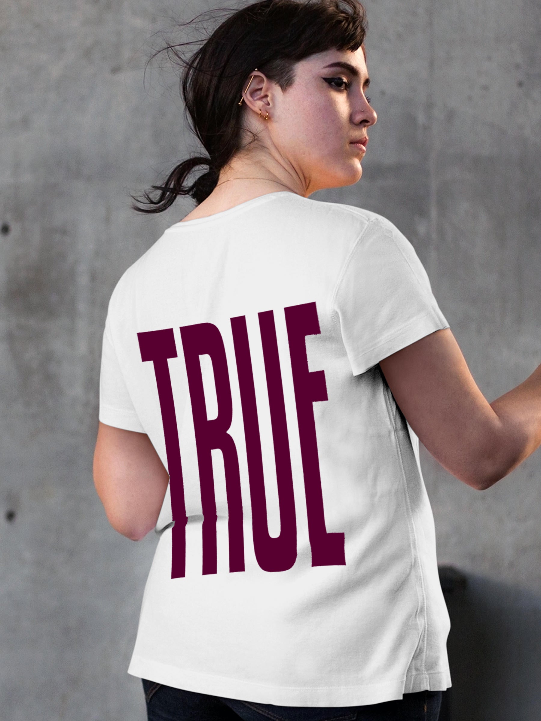 Model wearing Women's White Round Neck T-shirt with 'Truth' design, offering effortless style and premium comfort