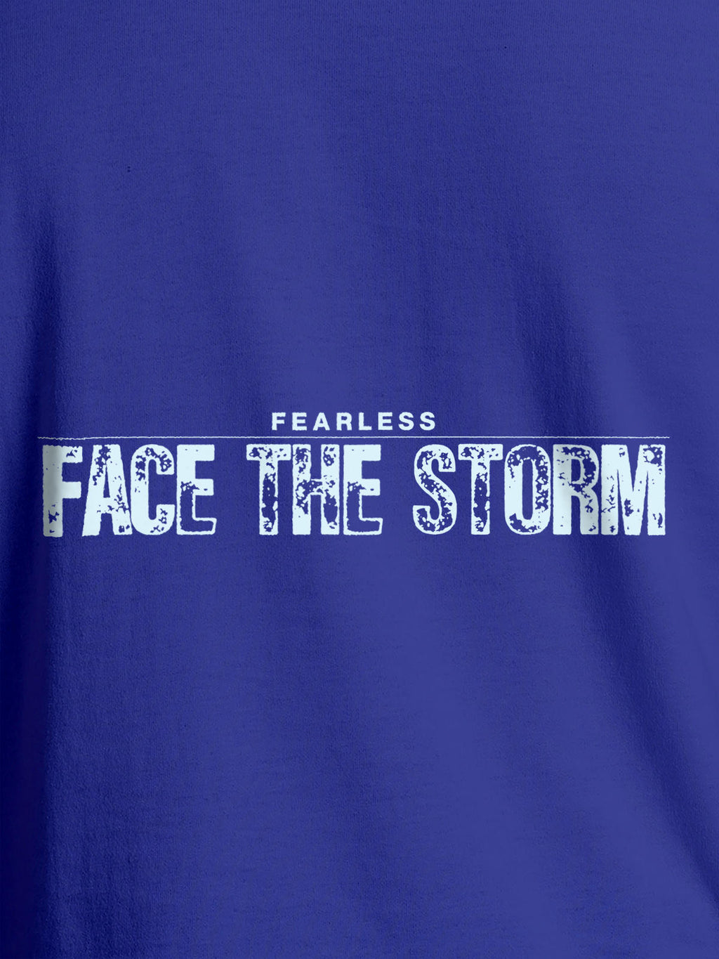 Close up of 'Fearless. Face the Storm' design on Women's Blue Round Neck T-shirt, highlighting intricate details and vibrant print.