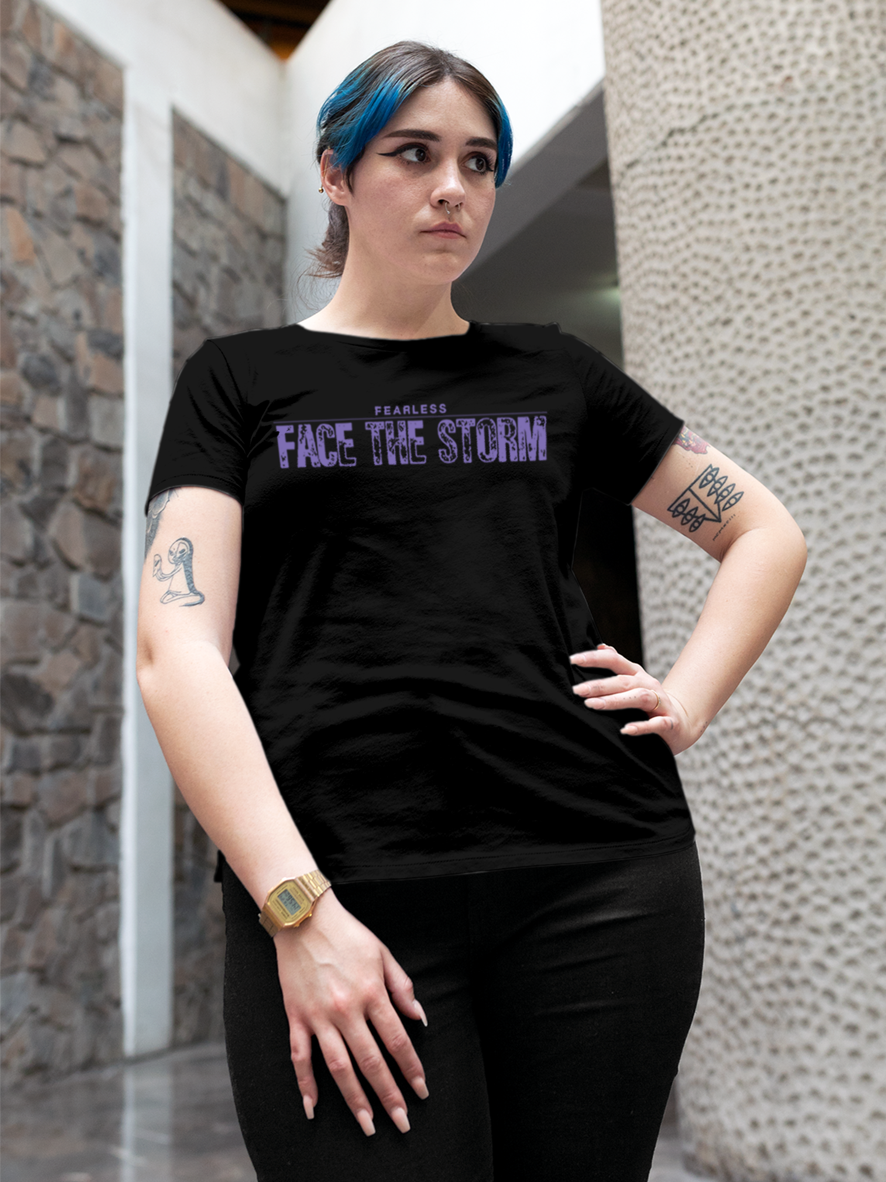 Model wearing Women's Black Round Neck T-shirt with 'Fearless. Face the Storm' design, offering effortless style and premium comfort