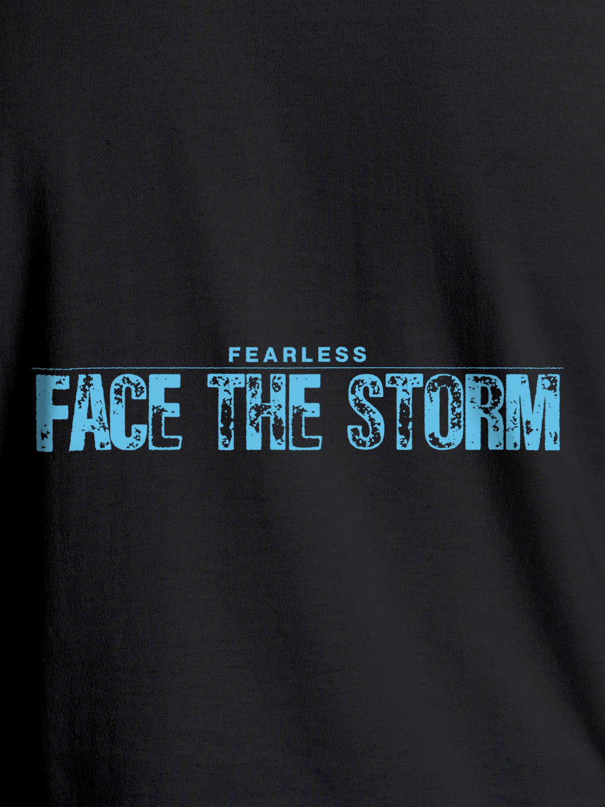 Close up of 'Fearless. Face the Storm' design on Women's Dark Grey Round Neck T-shirt, highlighting intricate details and vibrant print.