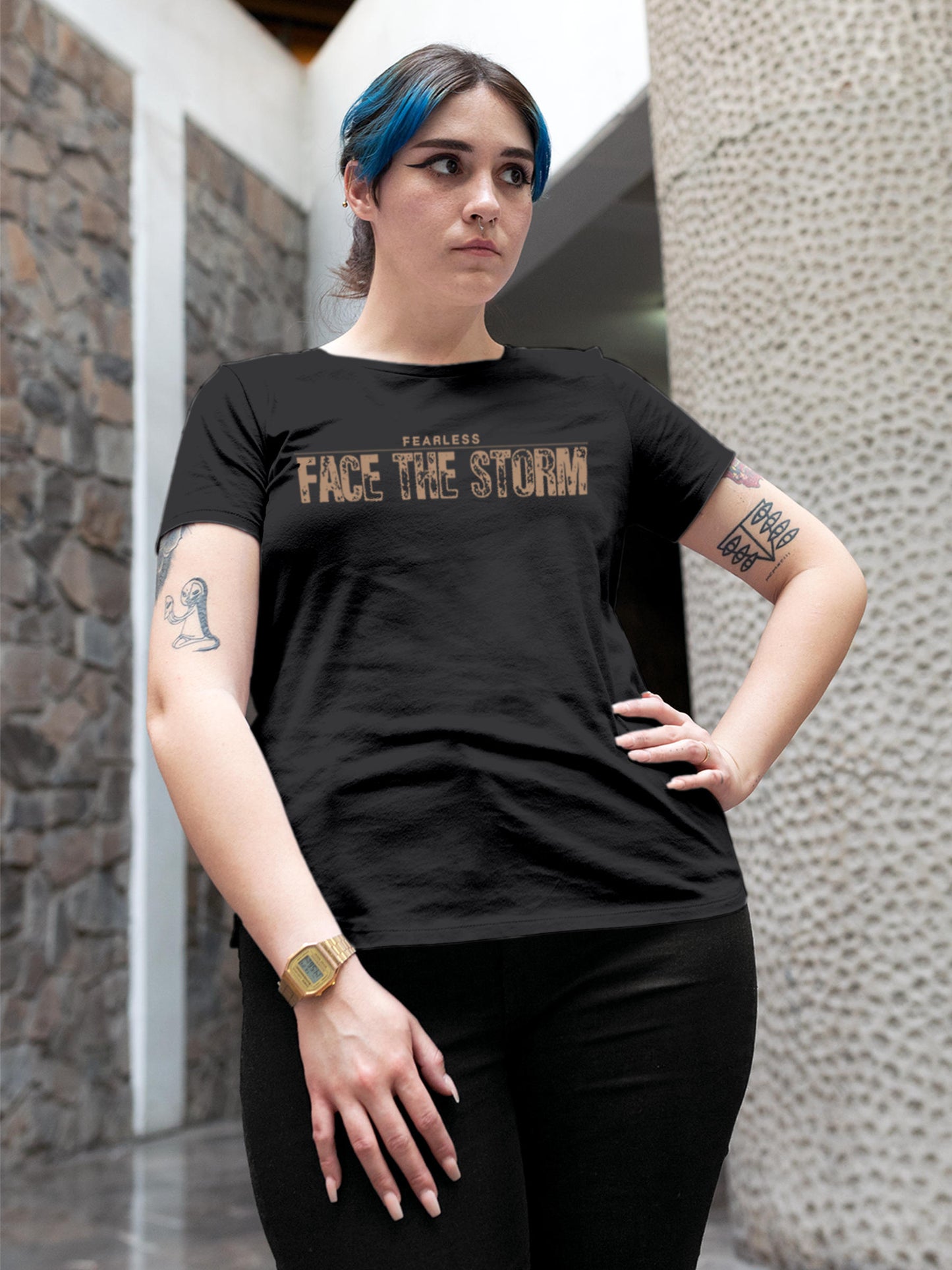 Model wearing Women's Dark Grey Round Neck T-shirt with 'Fearless. Face the Storm' design, offering effortless style and premium comfort