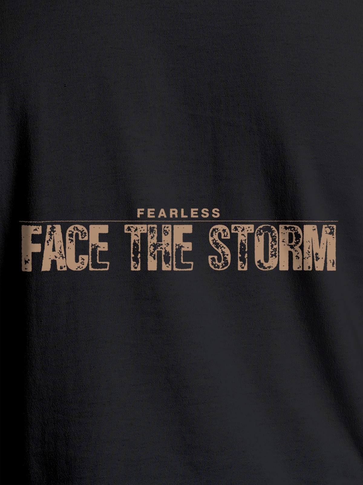 Close up of 'Fearless. Face the Storm' design on Women's Dark Grey Round Neck T-shirt, highlighting intricate details and vibrant print.