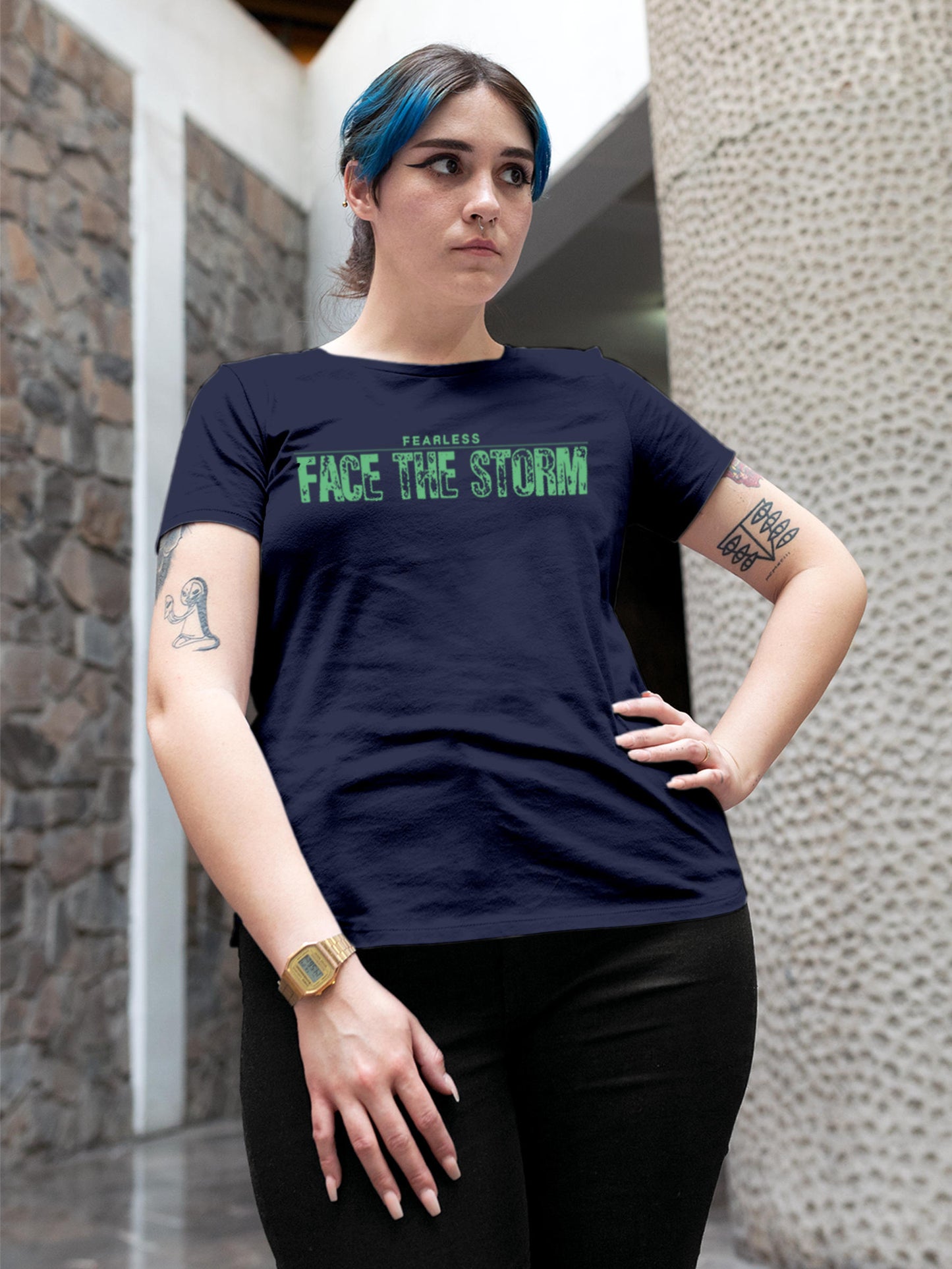 Model wearing Women's Navy Blue Round Neck T-shirt with 'Fearless. Face the Storm' design, offering effortless style and premium comfort