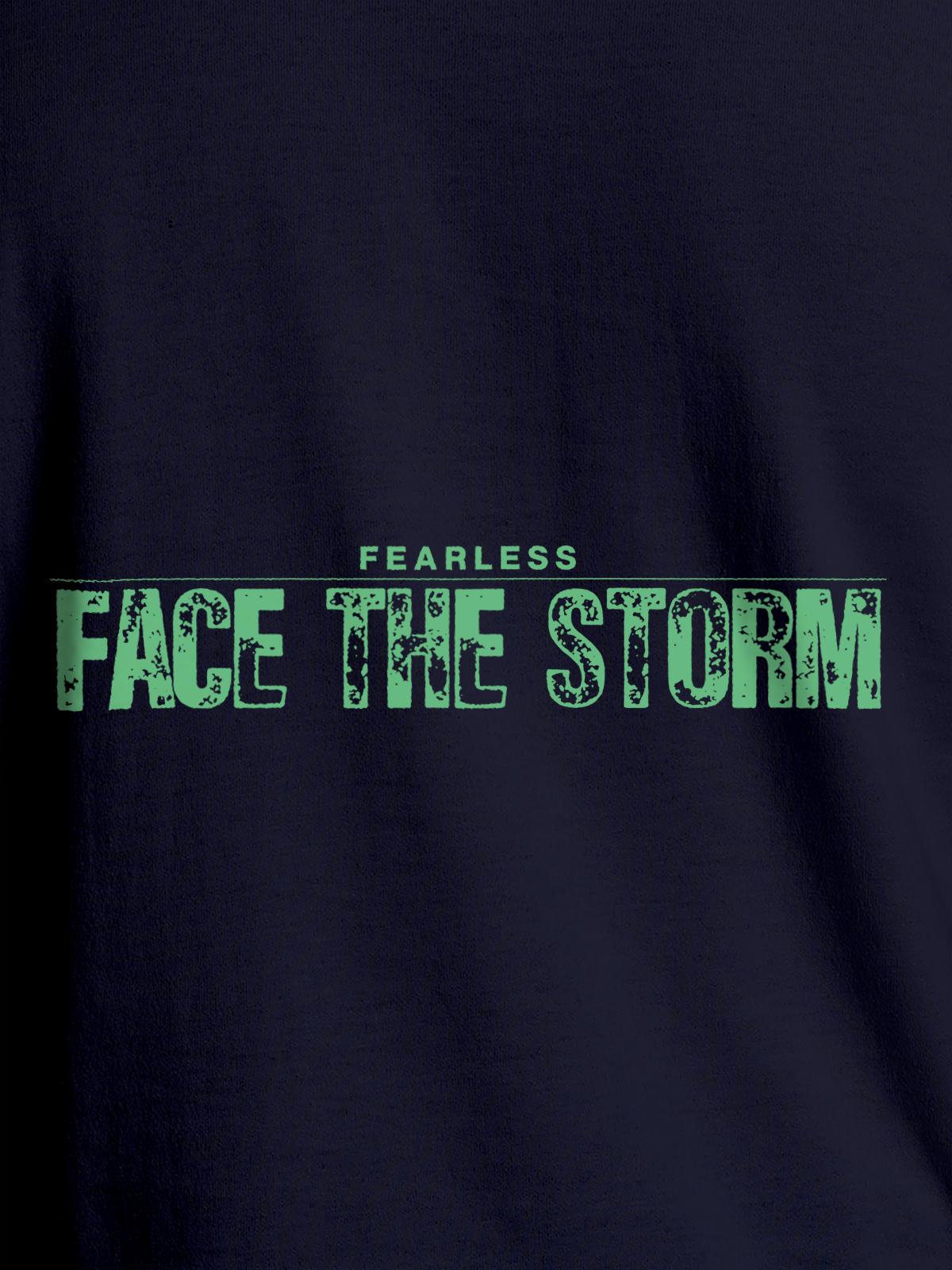 Close up of 'Fearless. Face the Storm' design on Women's Navy Blue Round Neck T-shirt, highlighting intricate details and vibrant print.