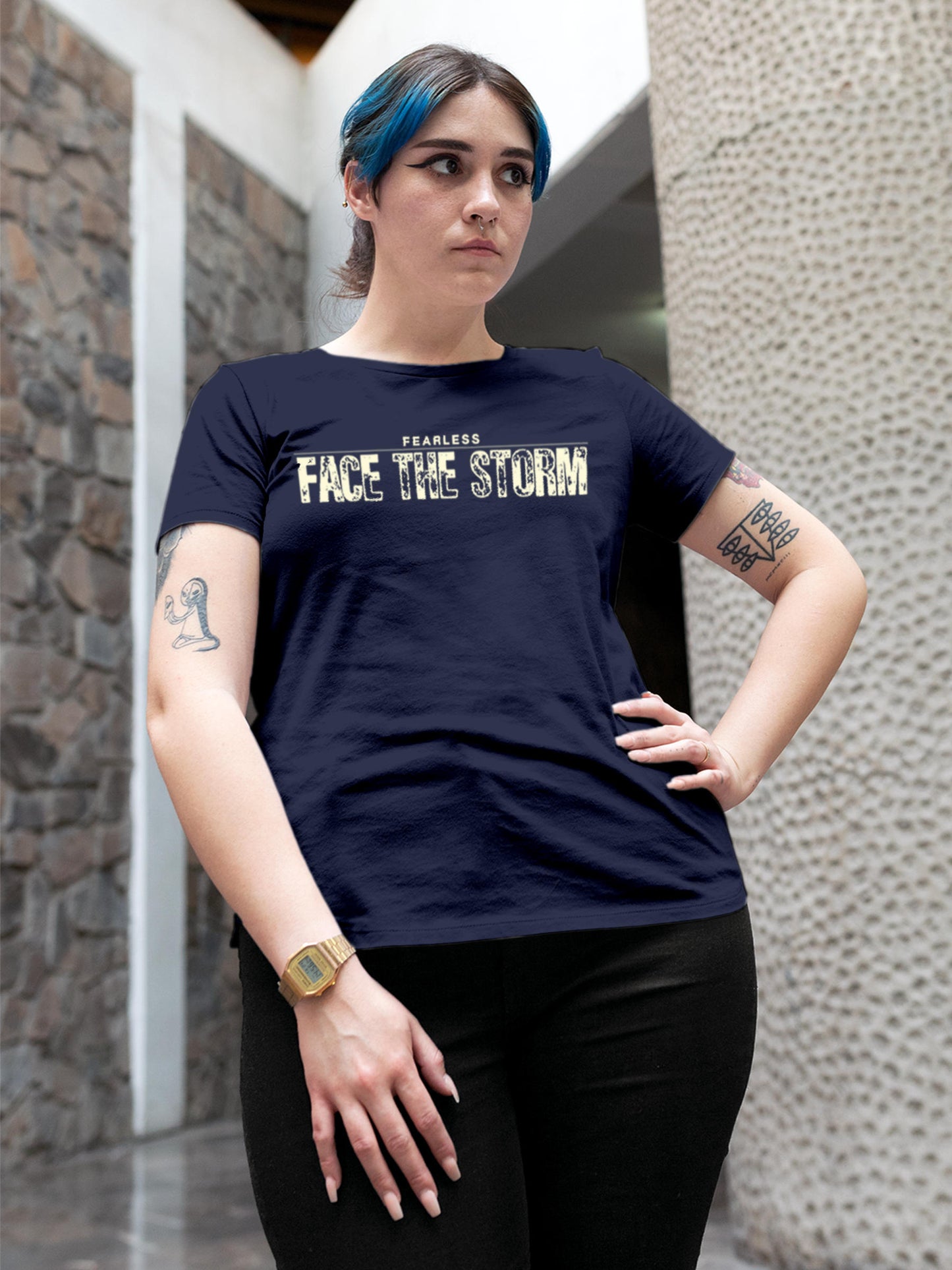 Model wearing Women's Navy Blue Round Neck T-shirt with 'Fearless. Face the Storm' design, offering effortless style and premium comfort