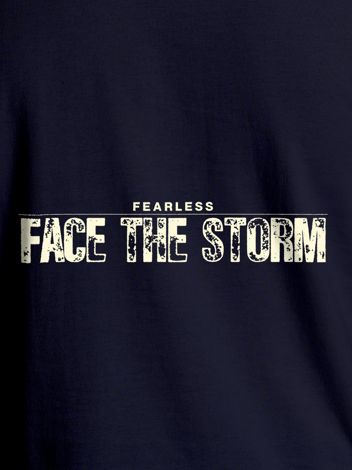 Close up of 'Fearless. Face the Storm' design on Women's Navy Blue Round Neck T-shirt, highlighting intricate details and vibrant print.