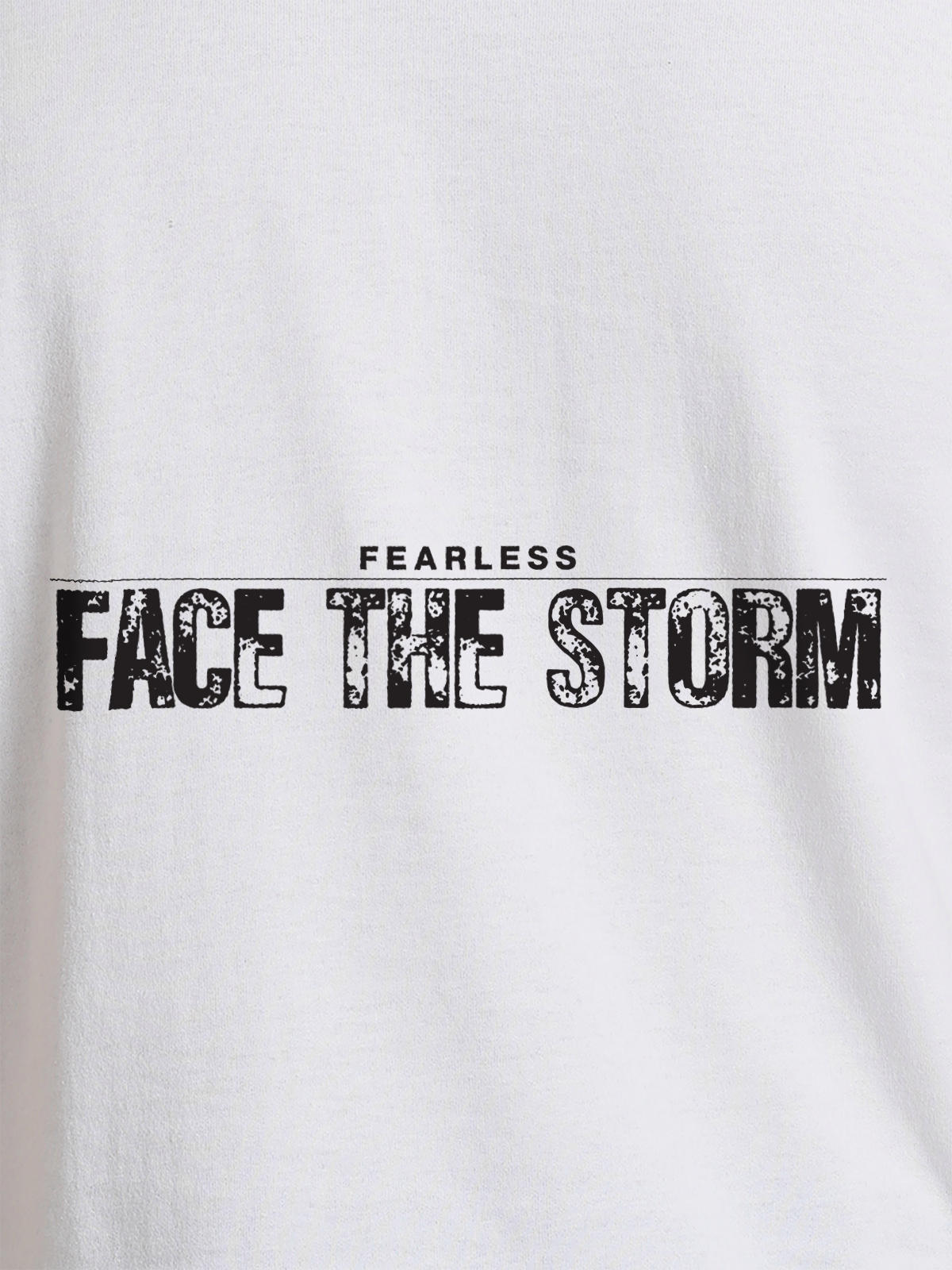 Close up of 'Fearless. Face the Storm' design on Women's White Round Neck T-shirt, highlighting intricate details and vibrant print.