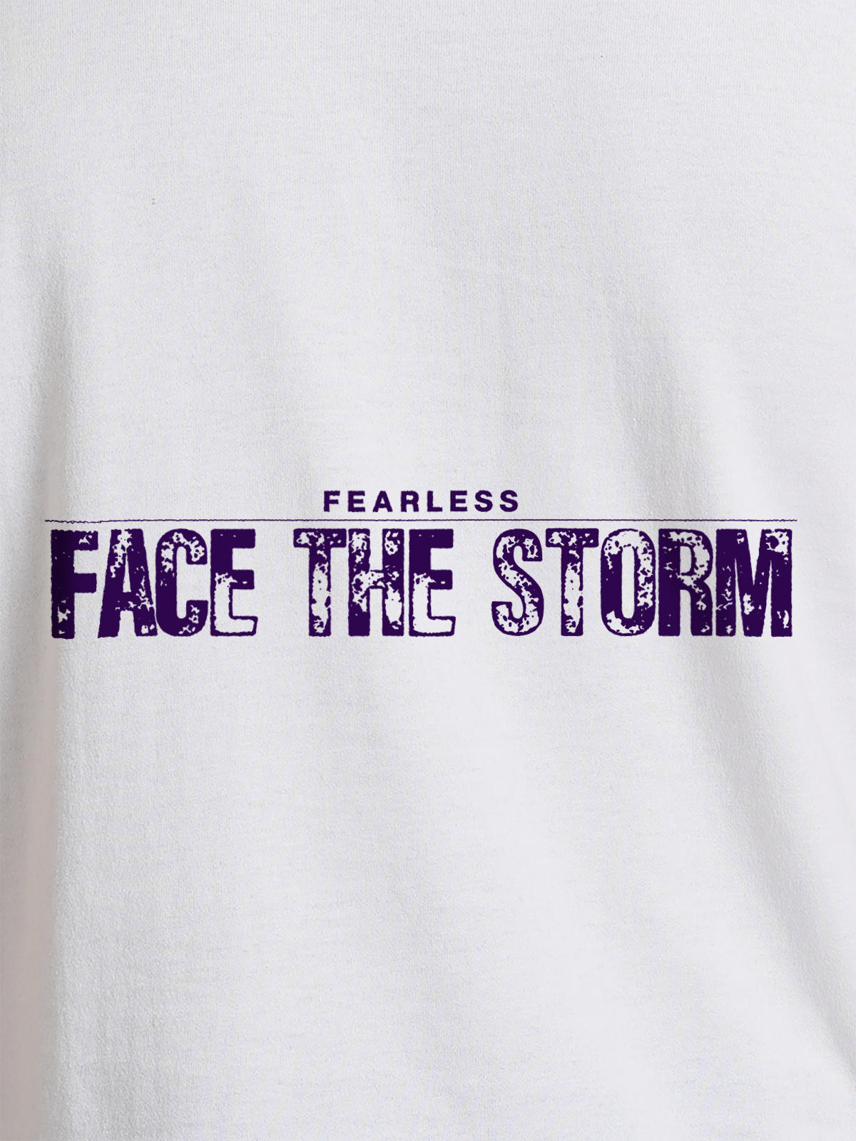 Close up of 'Fearless. Face the Storm' design on Women's White Round Neck T-shirt, highlighting intricate details and vibrant print.