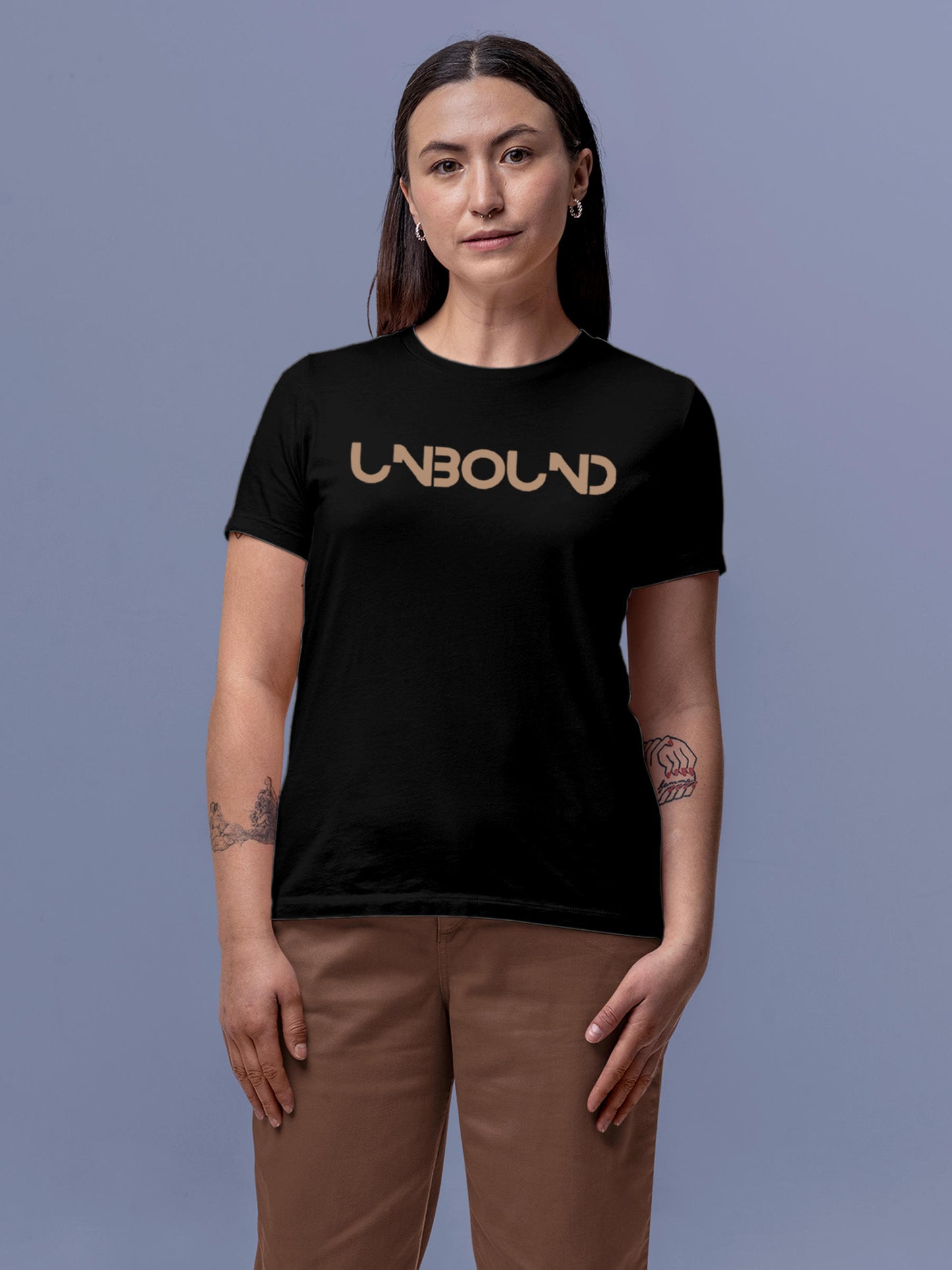 Model wearing Women's Black Round Neck T-shirt with 'Unbound' design, offering effortless style and premium comfort