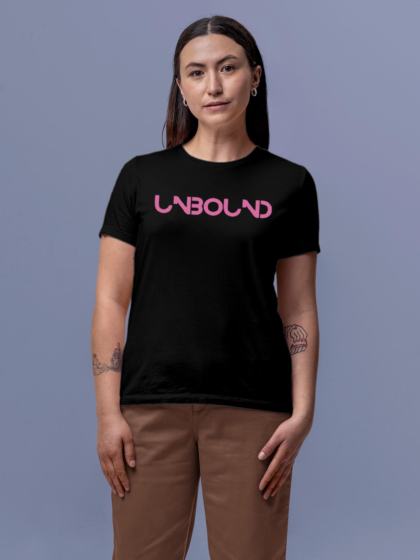 Model wearing Women's Black Round Neck T-shirt with 'Unbound' design, offering effortless style and premium comfort