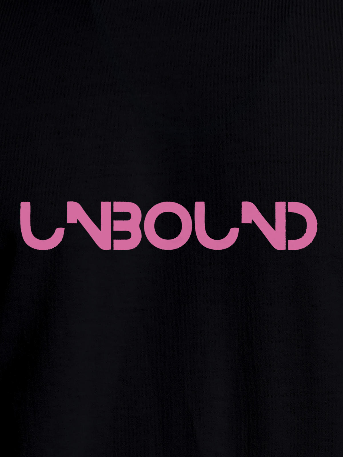 Close up of 'Unbound' design on Women's Black Round Neck T-shirt, highlighting intricate details and vibrant print.