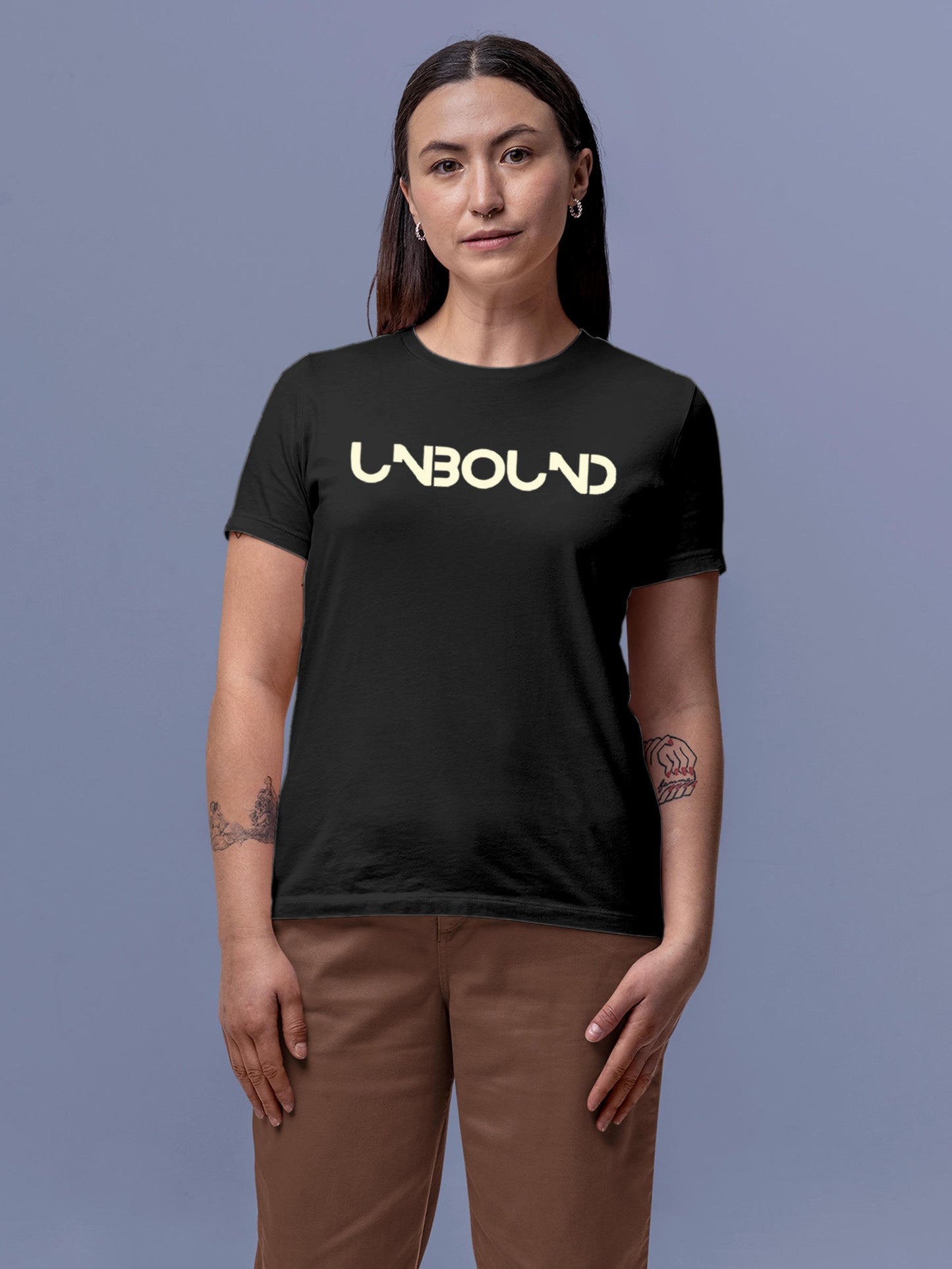 Model wearing Women's Dark Grey Round Neck T-shirt with 'Unbound' design, offering effortless style and premium comfort