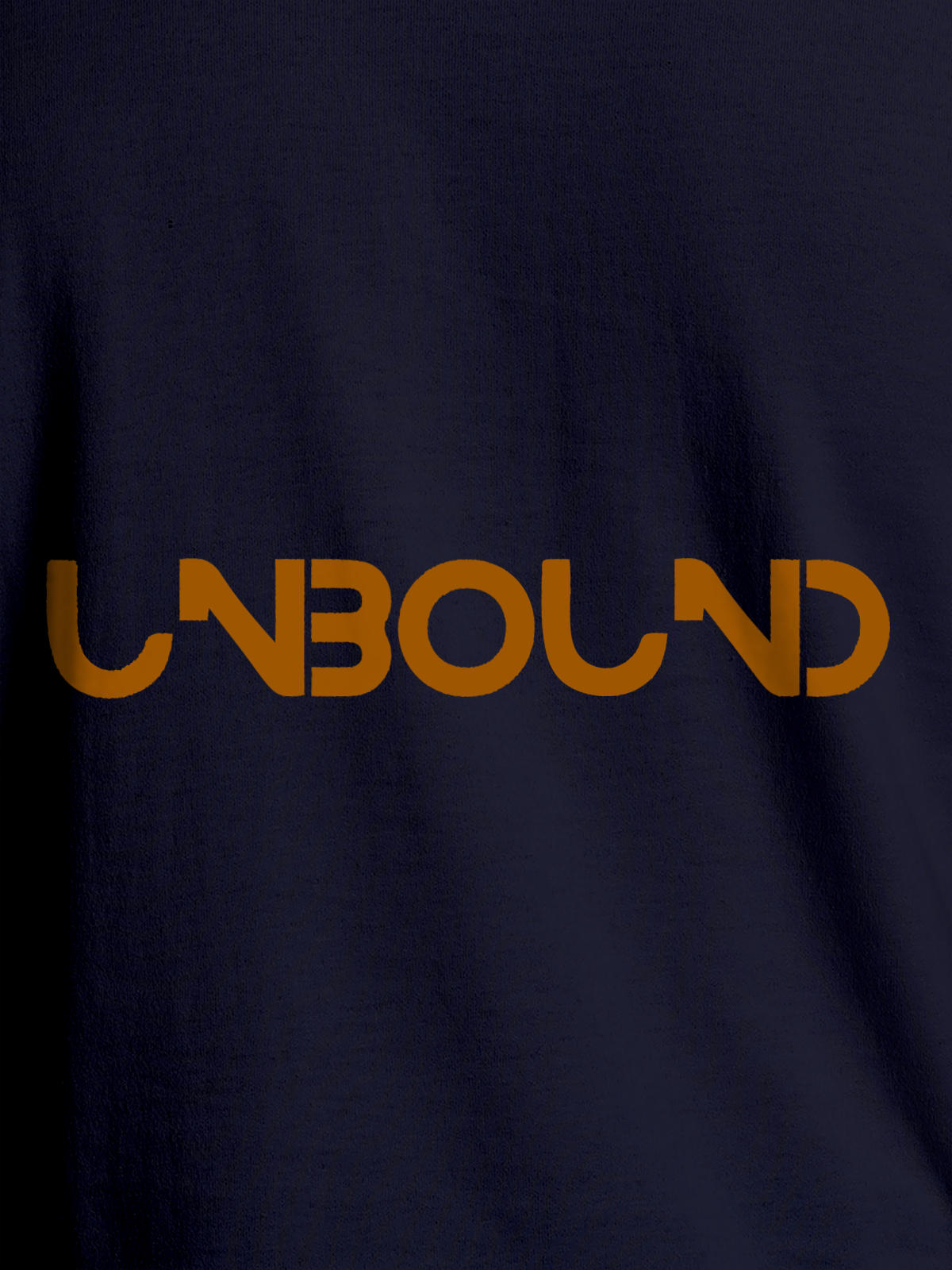 Close up of 'Unbound' design on Men's Navy Blue Round Neck T-shirt, highlighting intricate details and vibrant print.