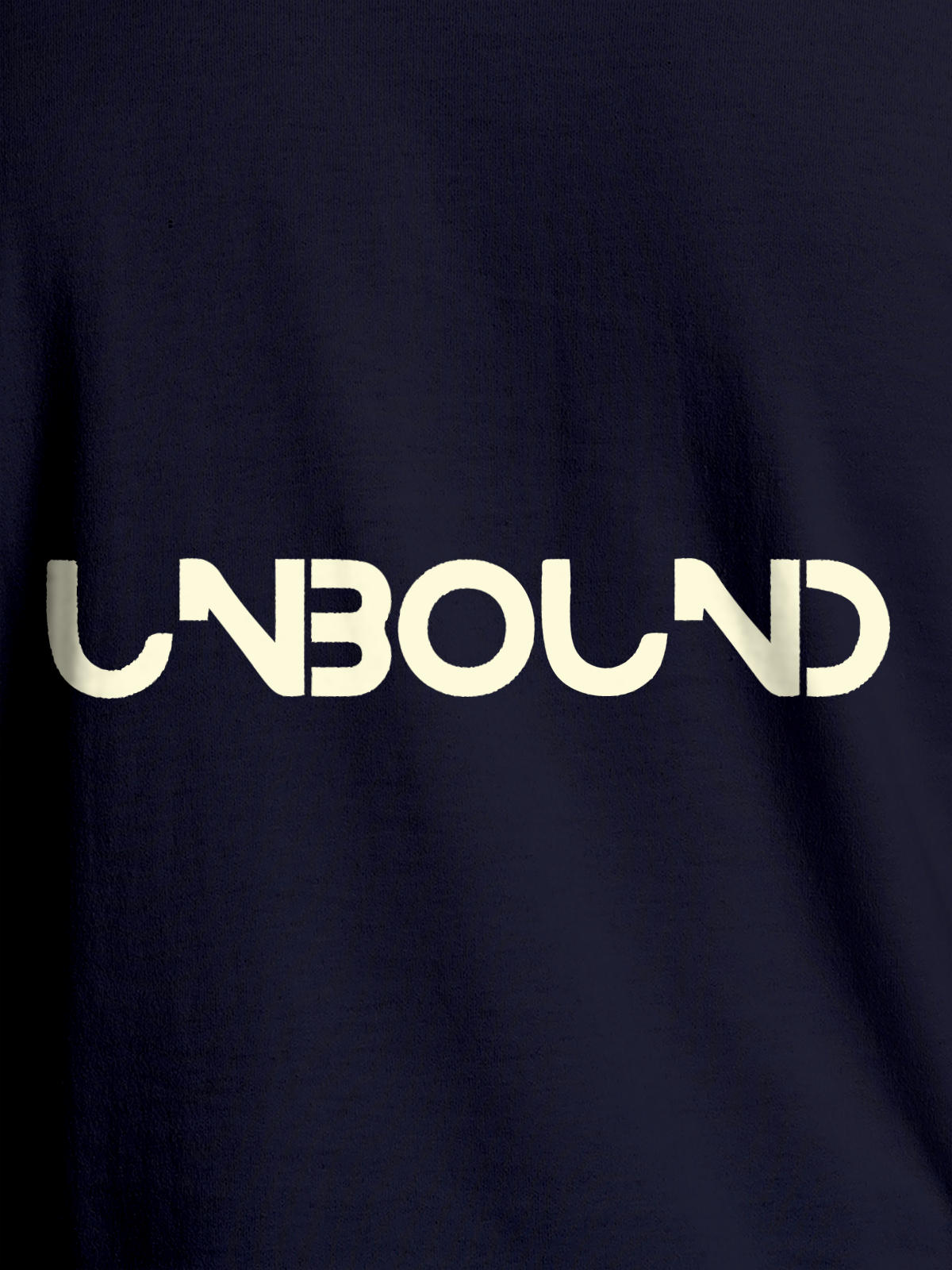 Close up of 'Unbound' design on Men's Navy Blue Round Neck T-shirt, highlighting intricate details and vibrant print.