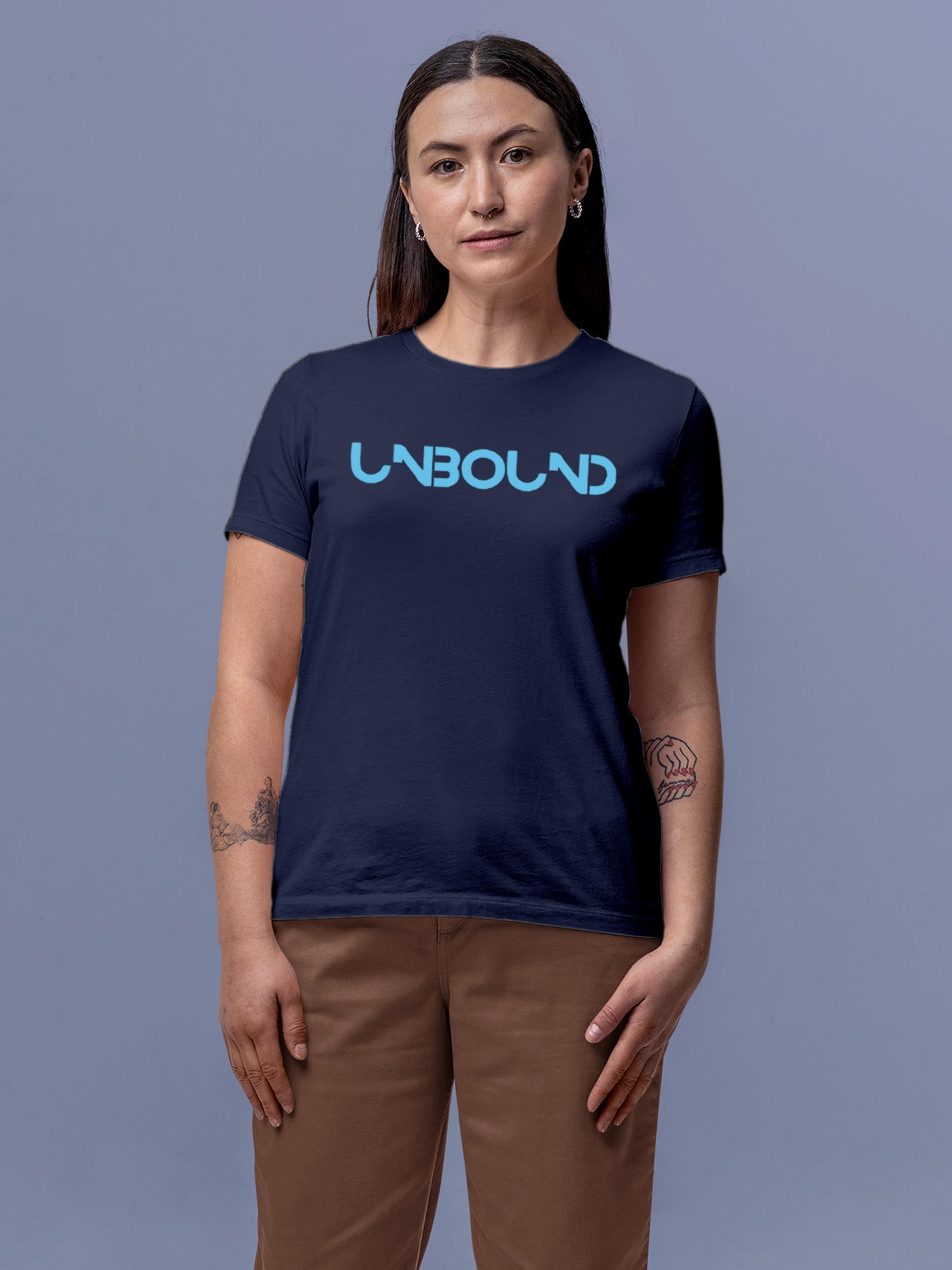 Model wearing Women's Navy Blue Round Neck T-shirt with 'Unbound' design, offering effortless style and premium comfort