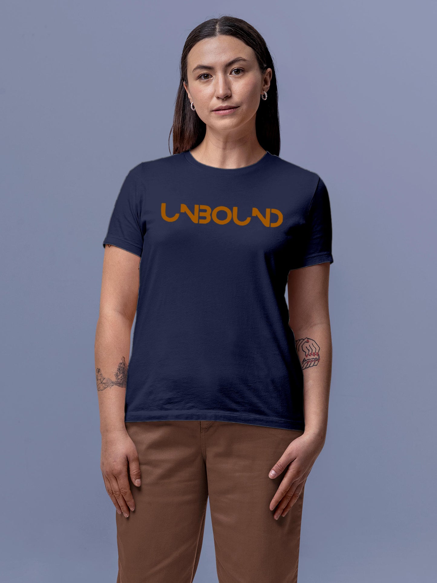Model wearing Women's Navy Blue Round Neck T-shirt with 'Unbound' design, offering effortless style and premium comfort