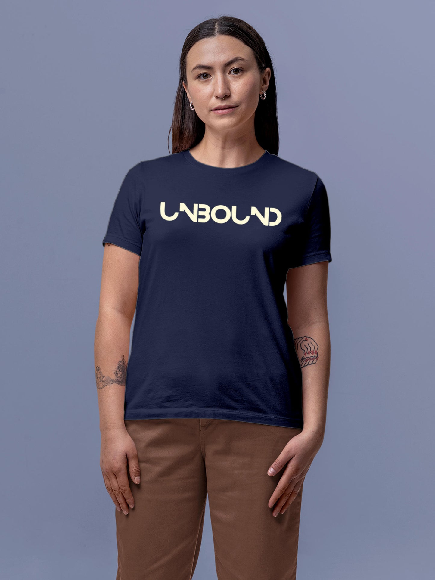 Model wearing Women's Navy Blue Round Neck T-shirt with 'Unbound' design, offering effortless style and premium comfort
