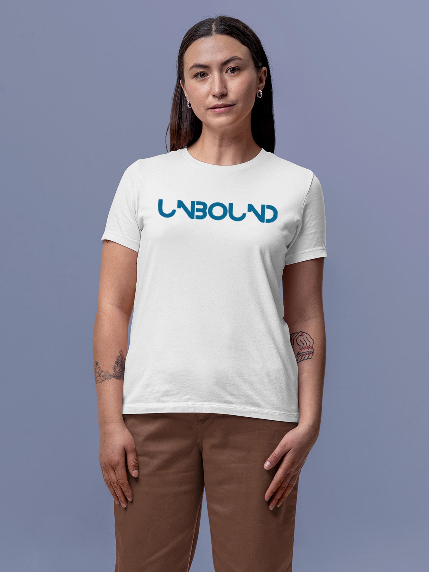 Model wearing Women's White Round Neck T-shirt with 'Unbound' design, offering effortless style and premium comfort