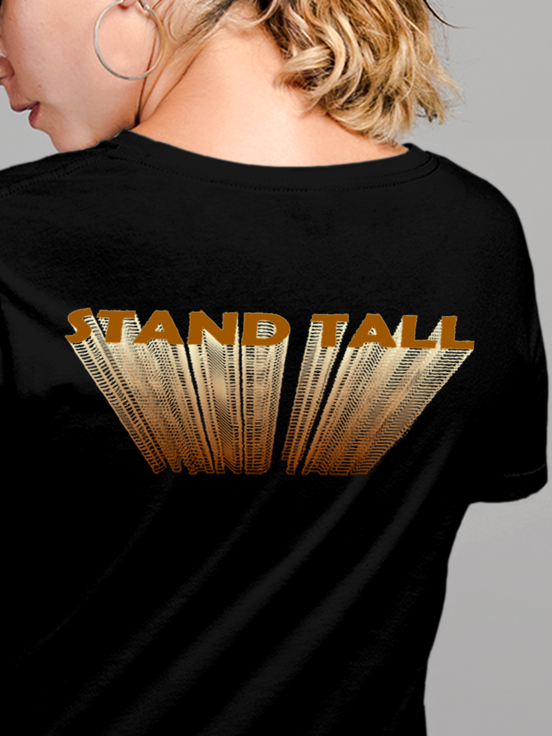 Close up of 'Stand Tall' design on Women's Black Round Neck T-shirt, highlighting intricate details and vibrant print.