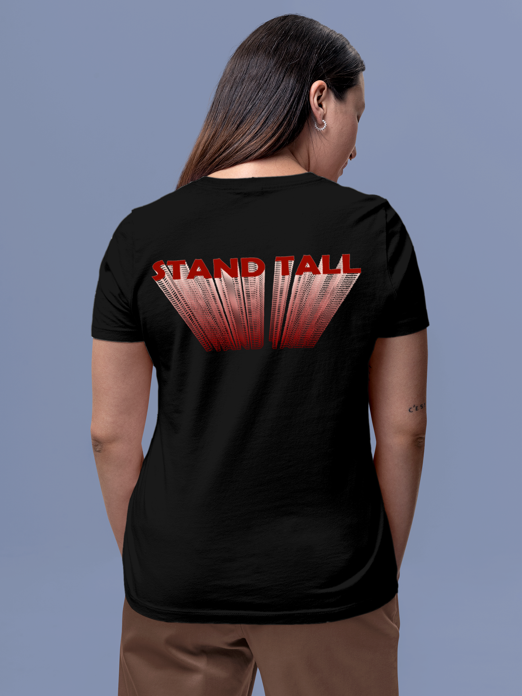 Model wearing Women's Black Round Neck T-shirt with 'Stand Tall' design, offering effortless style and premium comfort