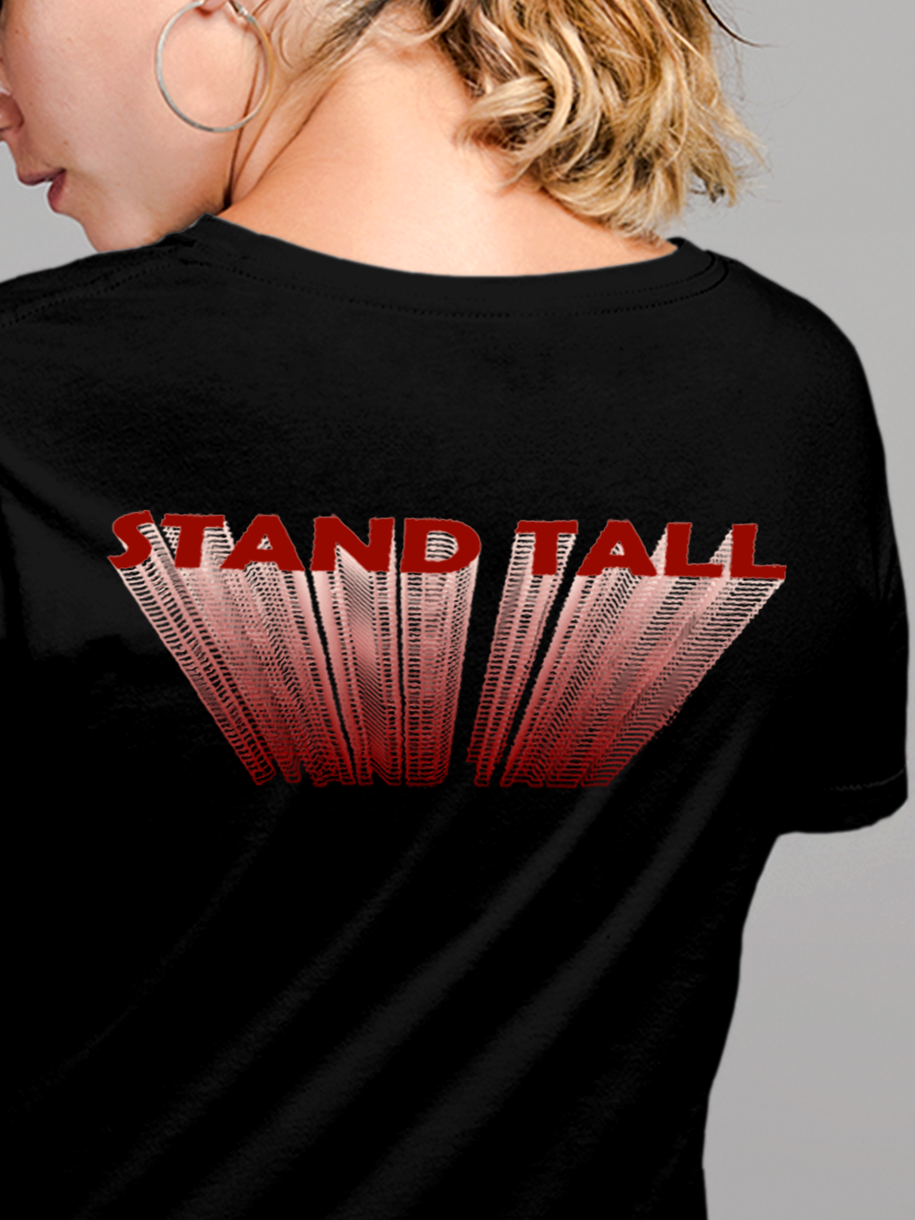 Close up of 'Stand Tall' design on Women's Black Round Neck T-shirt, highlighting intricate details and vibrant print.