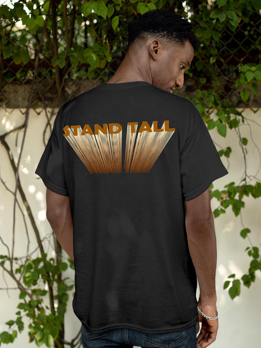 Model wearing Men's Dark Grey Round Neck T-shirt with 'Stand Tall' design, offering effortless style and premium comfort