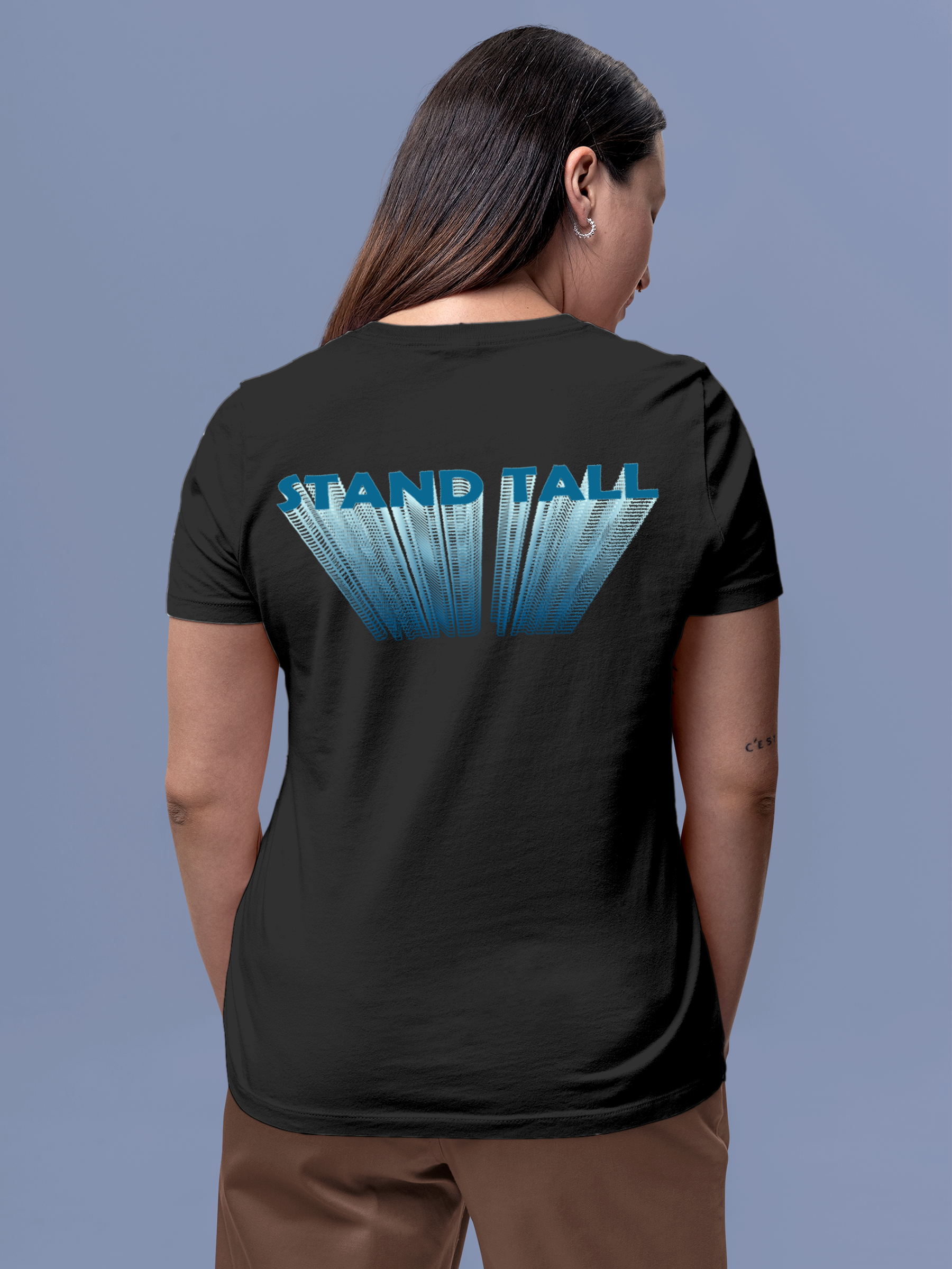 Model wearing Women's Dark Grey Round Neck T-shirt with 'Stand Tall' design, offering effortless style and premium comfort