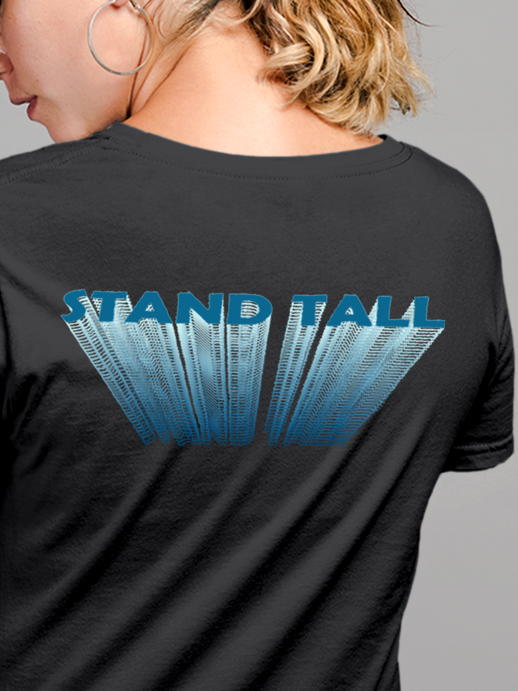 Close up of 'Stand Tall' design on Women's Dark Grey Round Neck T-shirt, highlighting intricate details and vibrant print.